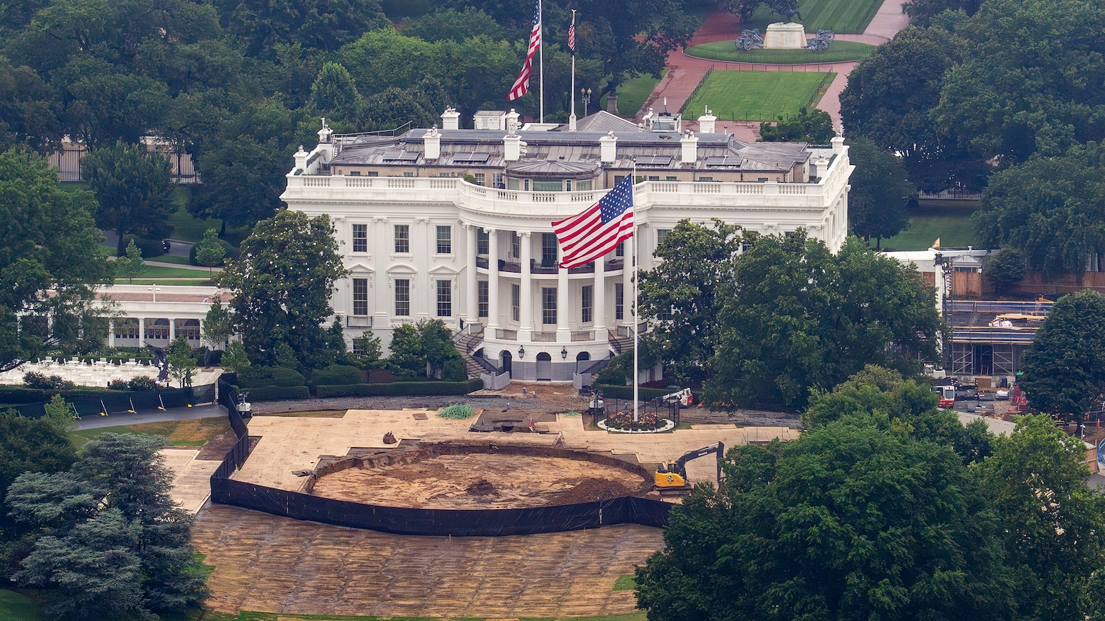 Construction continues as crews work after breaking down the Ultimate Fighting Championship Freedom 250 "Claw," a 92-foot-tall temporary stadium on the South Lawn, June 28, 2026 in Washington.