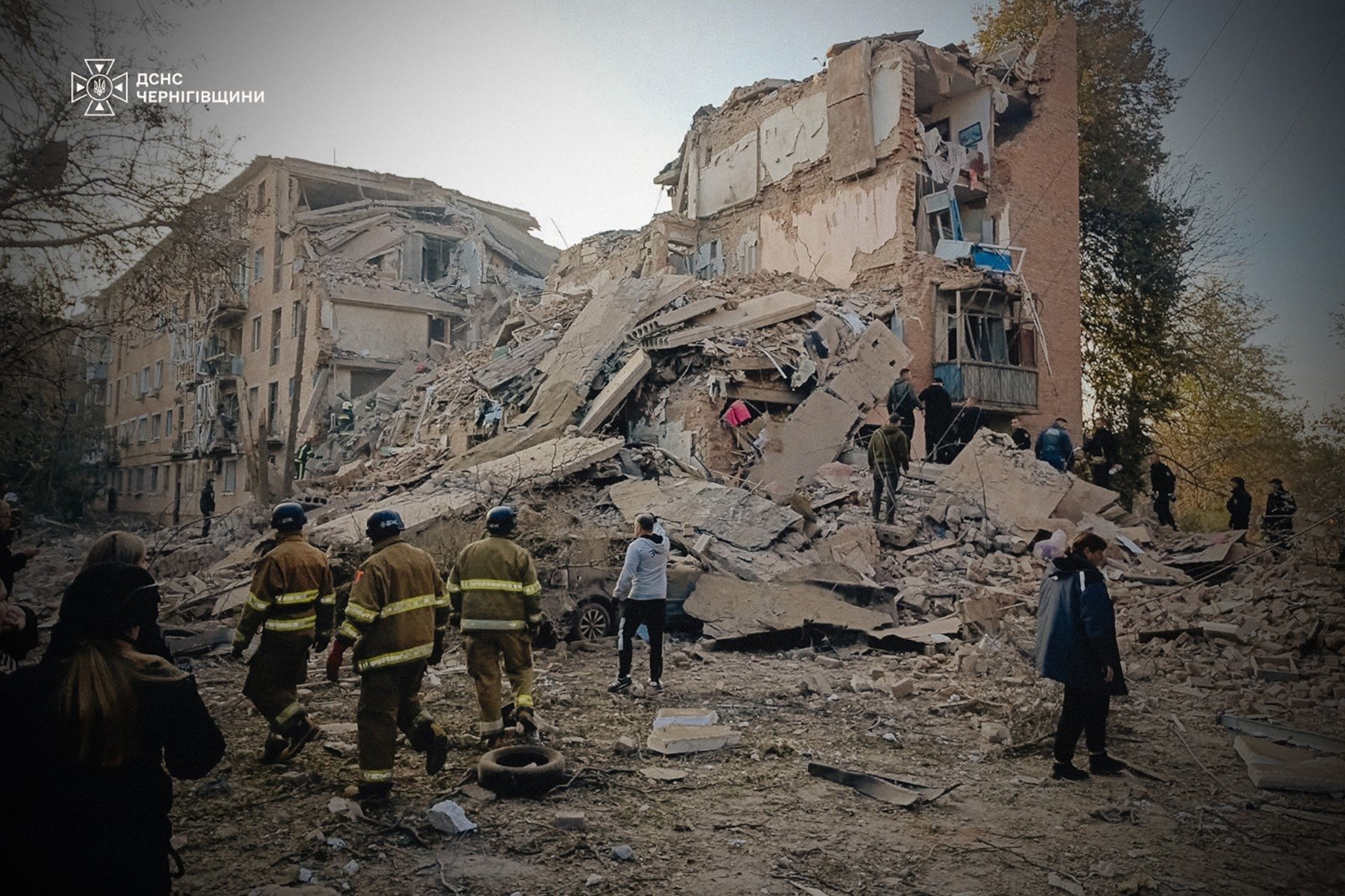 PHOTO: A handout picture taken and released by Ukraine's State Emergency Service on October 7, 2026 shows rescuers working on a residential building.g