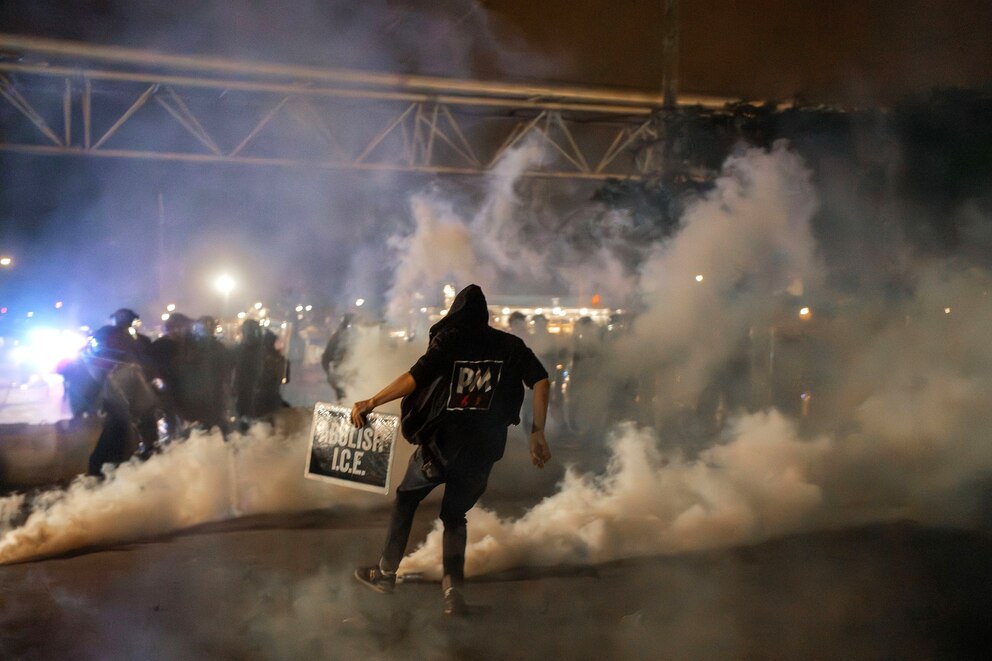 PHOTO: An anti-ICE protester kicks away a gas canister deployed by the state police during a protest against the treatment of detainees in Newark, New Jersey, on May 29, 2026.