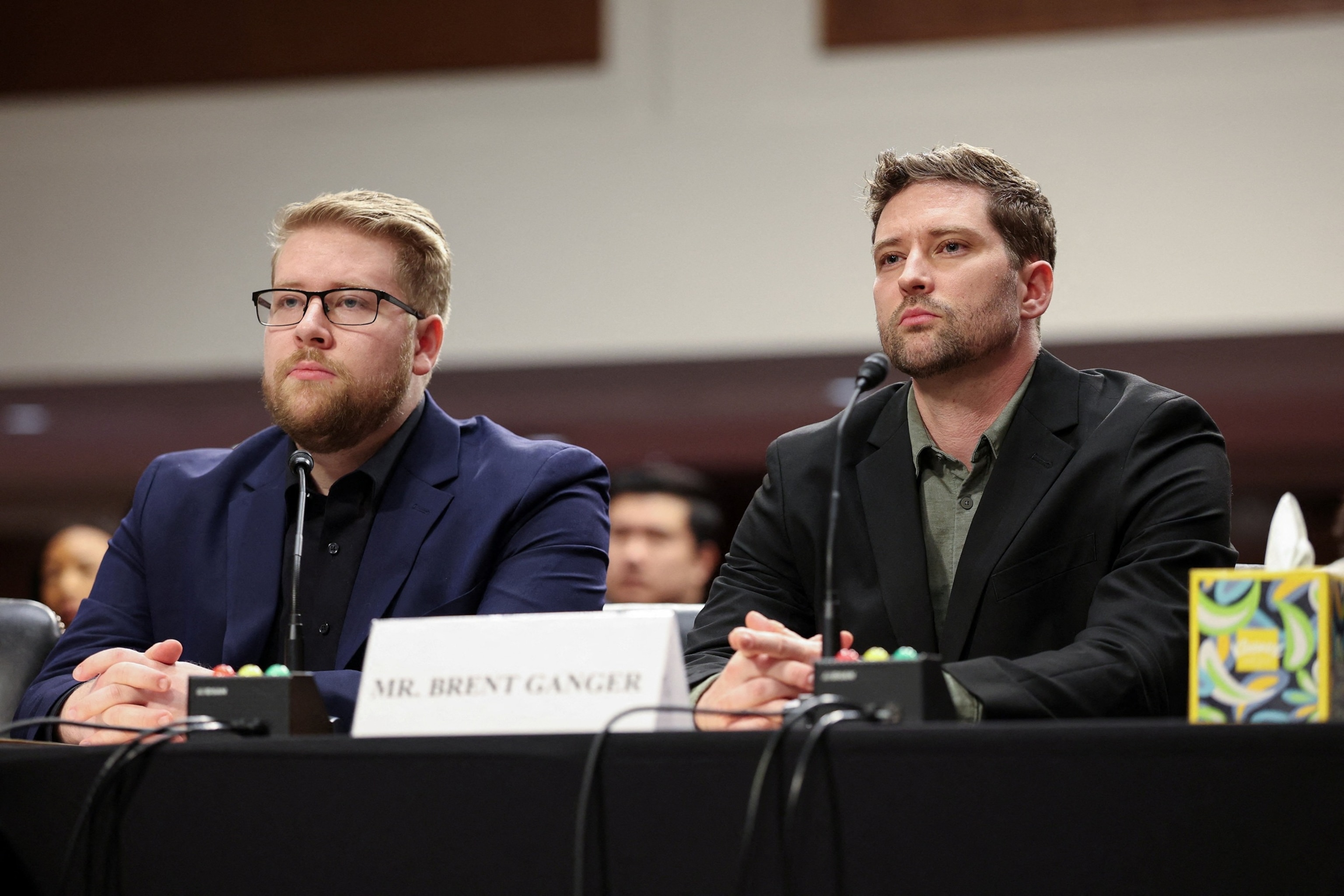 PHOTO: Luke and Brent Ganger, brothers of Renee Good, attend a public forum to discuss the use of violent force by DHS agents, on Capitol Hill in Washington, D.C., Feb. 3, 2026. 
