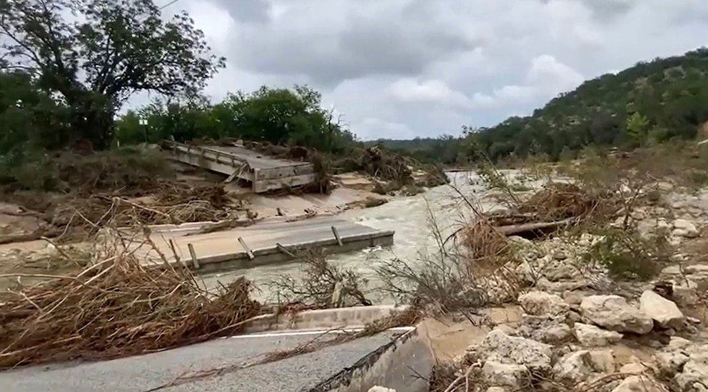 PHOTO: In this photo released by the Texas Department of Transportation, what remains of the bridge at RM 1431 and Cow Creek is shown after the devastating flood hit the area.