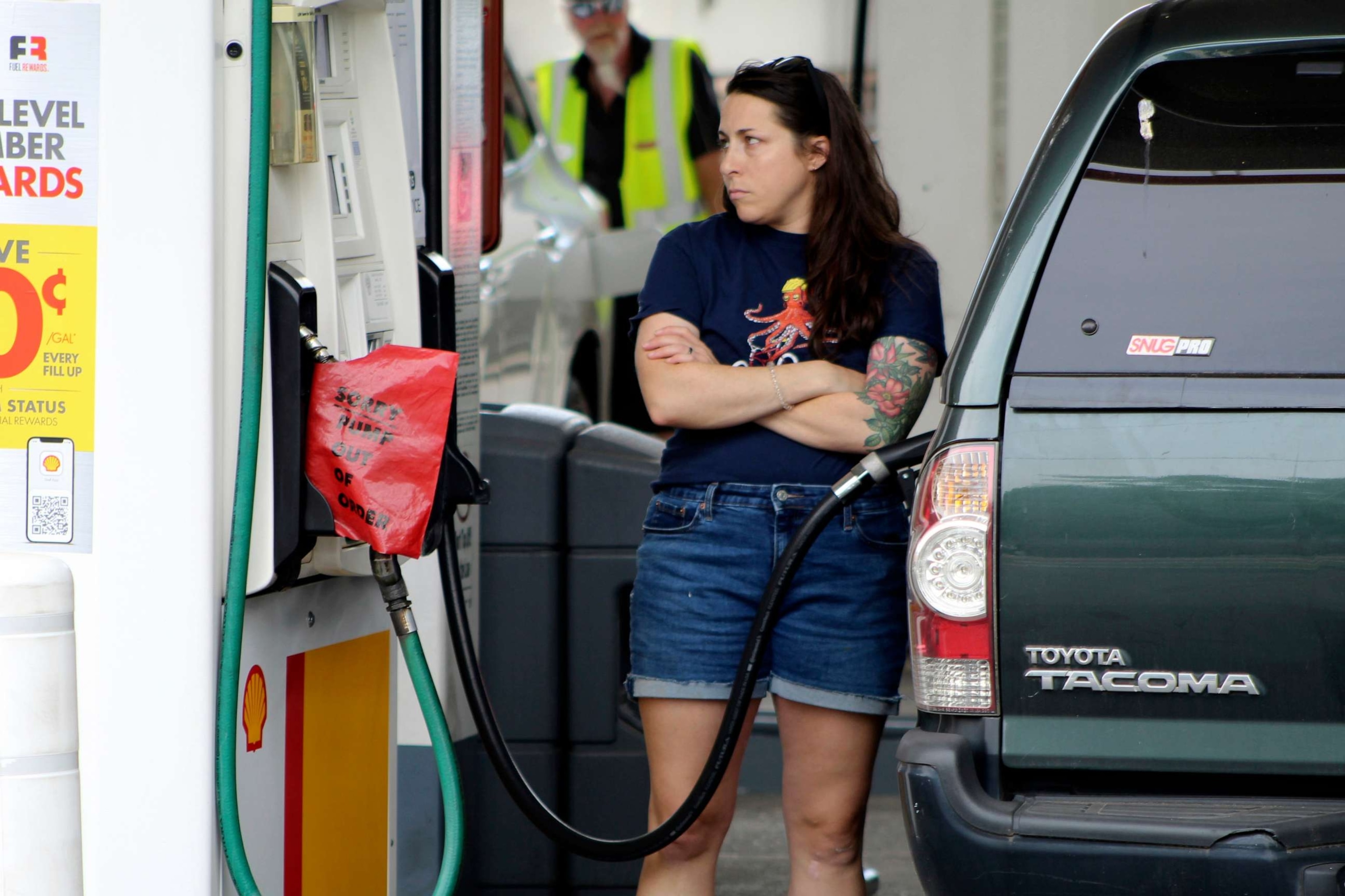 PHOTO: A customer fills up their car with gas at a gas station, Aug. 4, 2023, in Portland, Ore.