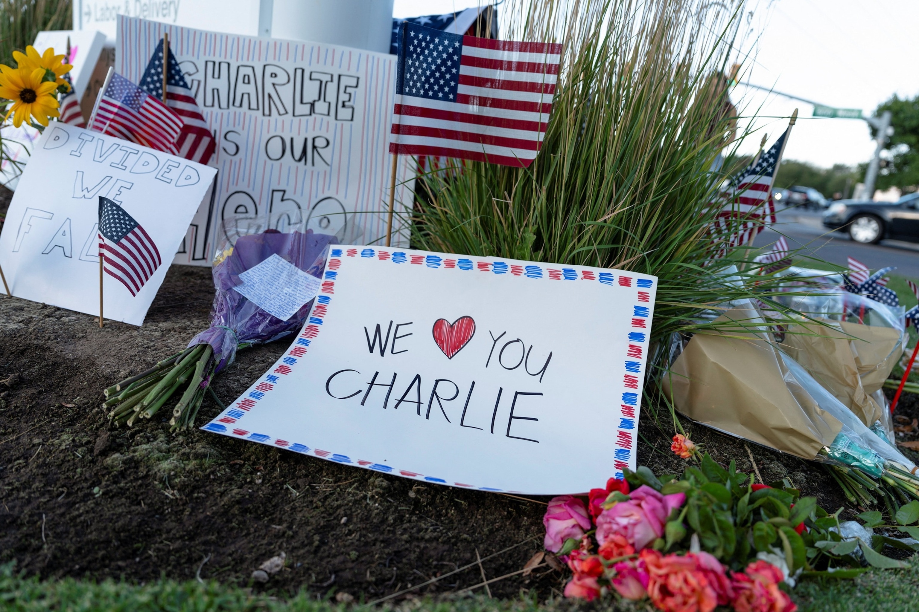 PHOTO: A sheet of paper commemorating Charlie Kirk is placed at a makeshift memorial for Charlie Kirk who was fatally shot during an event at Utah Valley University, outside of Timpanogos Regional Hospital, in Orem, Utah, September 11, 2025.