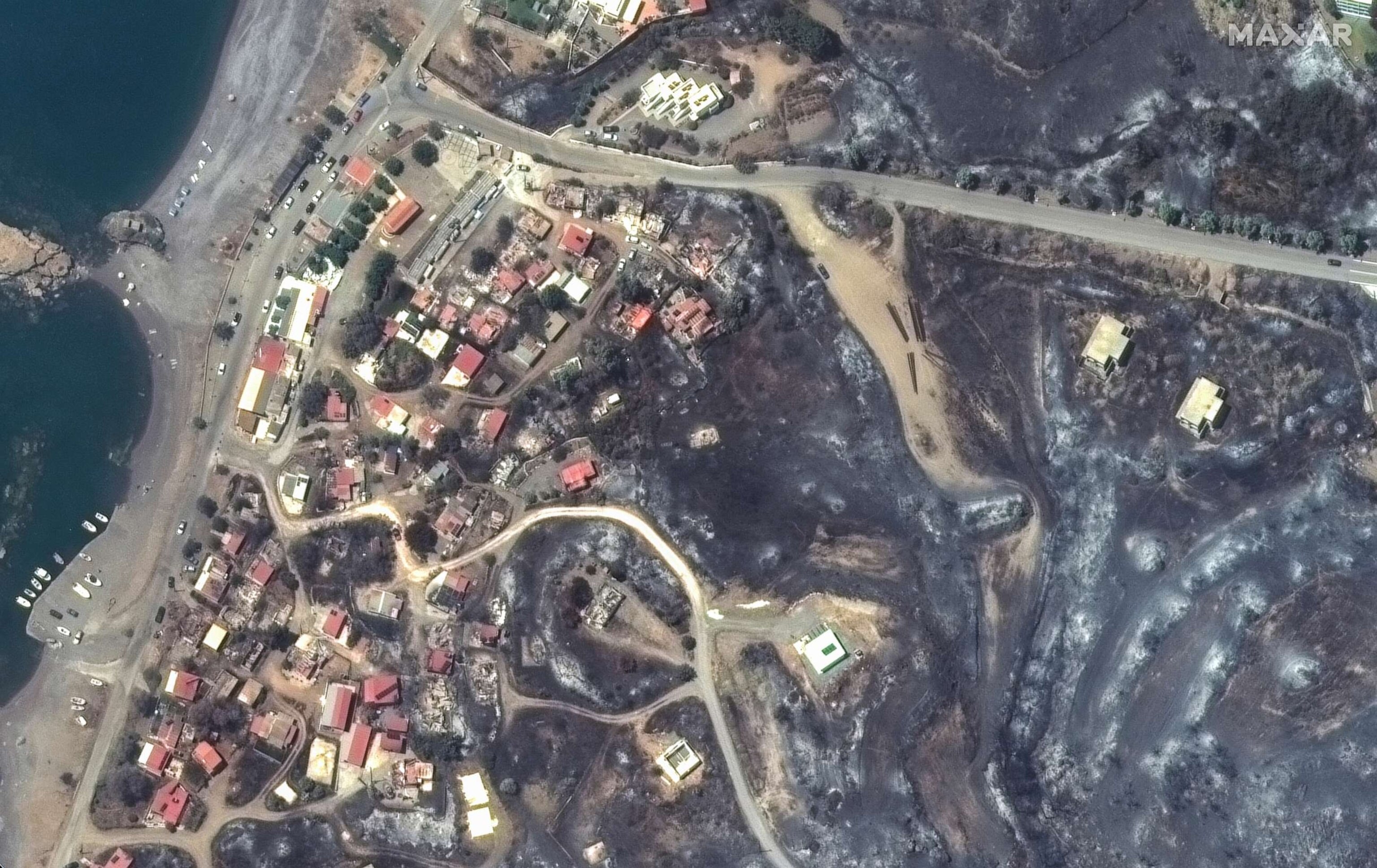 PHOTO: This image provided by Maxar Technologies, shows burned buildings along the coastline in Kiotari on the island of Rhodes, Greece, Monday July 24, 2023.