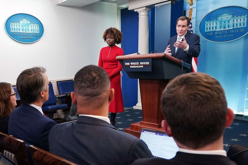 PHOTO: White House Press Karine Jean-Pierre watches as National Security Council Coordinator for Strategic Communications John Kirby (R) speaks during the daily press briefing at the White House in Washington, DC, Feb. 13, 2023.