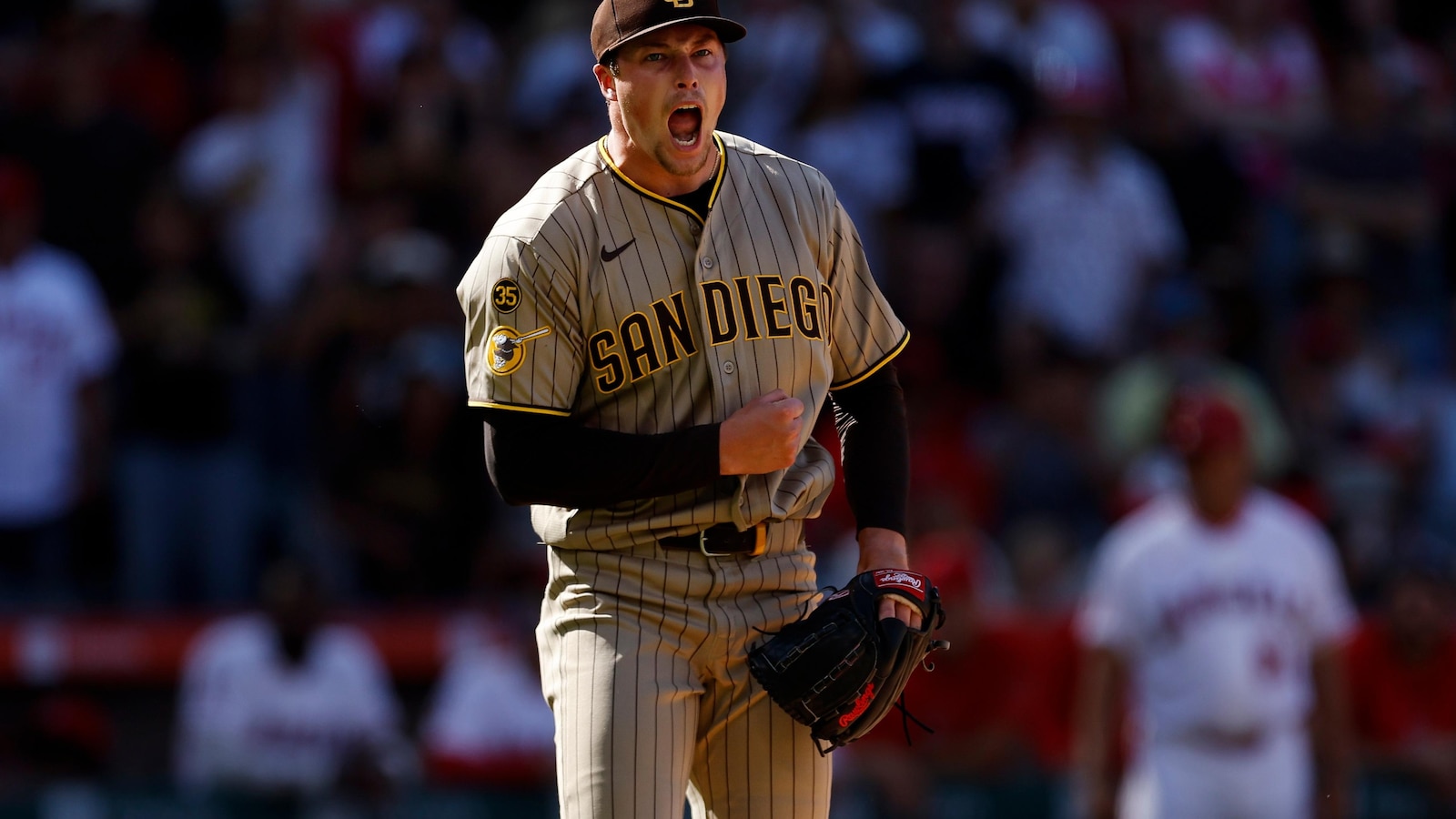 Mason Miller closes combined 2-hitter to extend his scoreless streak as Padres edge Angels 2-1