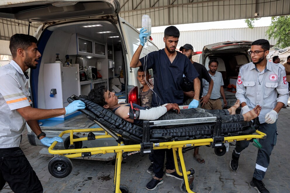 PHOTO: A young Palestinian, who was injured by gunfire is unloaded off an ambulance after arriving for medical care at the Shifa Hospital in Gaza City, July 27, 2025.