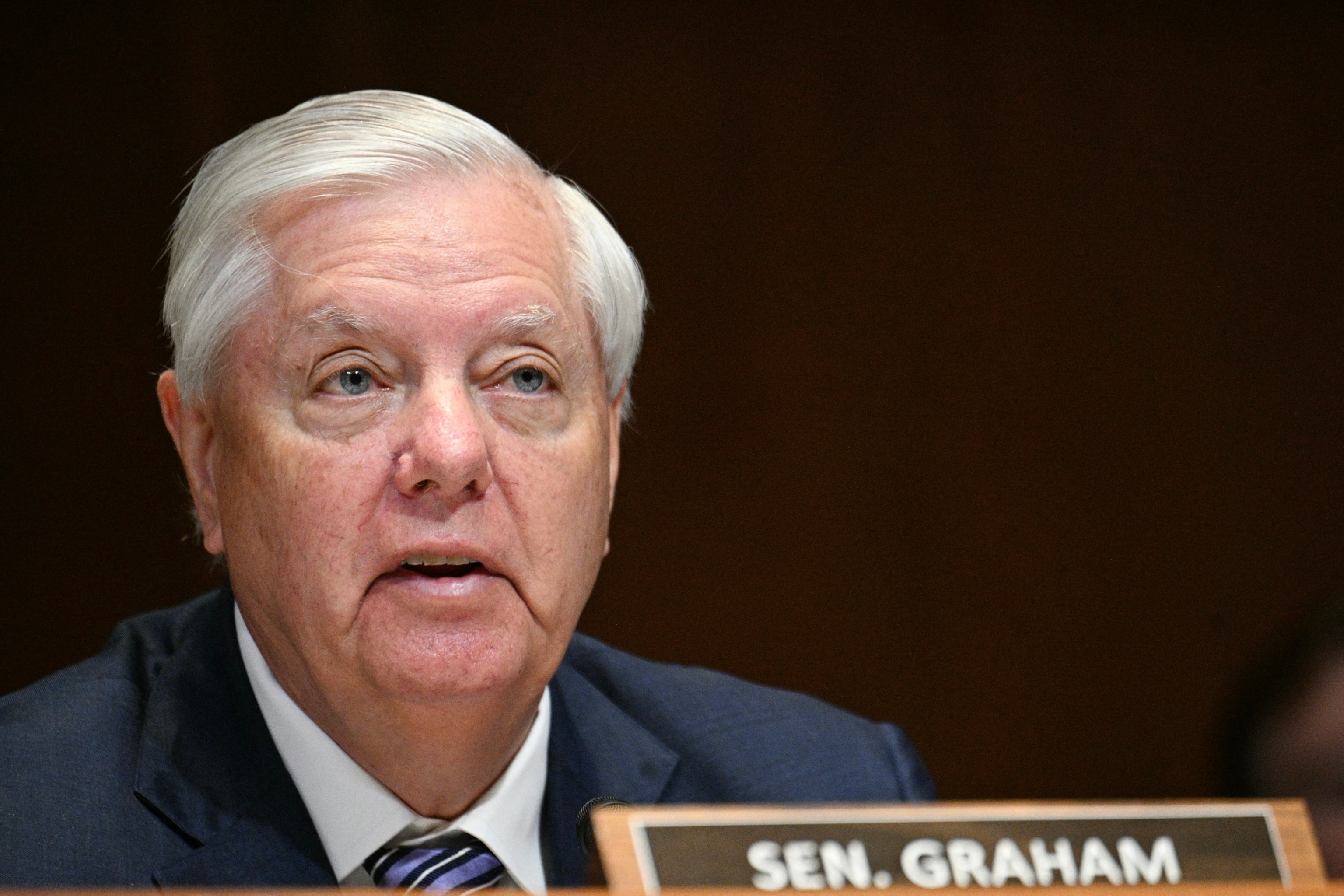PHOTO: Senator Lindsey Graham questions Secretary of Defense Pete Hegseth and Chairman of the Joint Chiefs of Staff General Dan Caine during a Senate Committee hearing on Capitol Hill in Washington, D.C., on May 12, 2026.