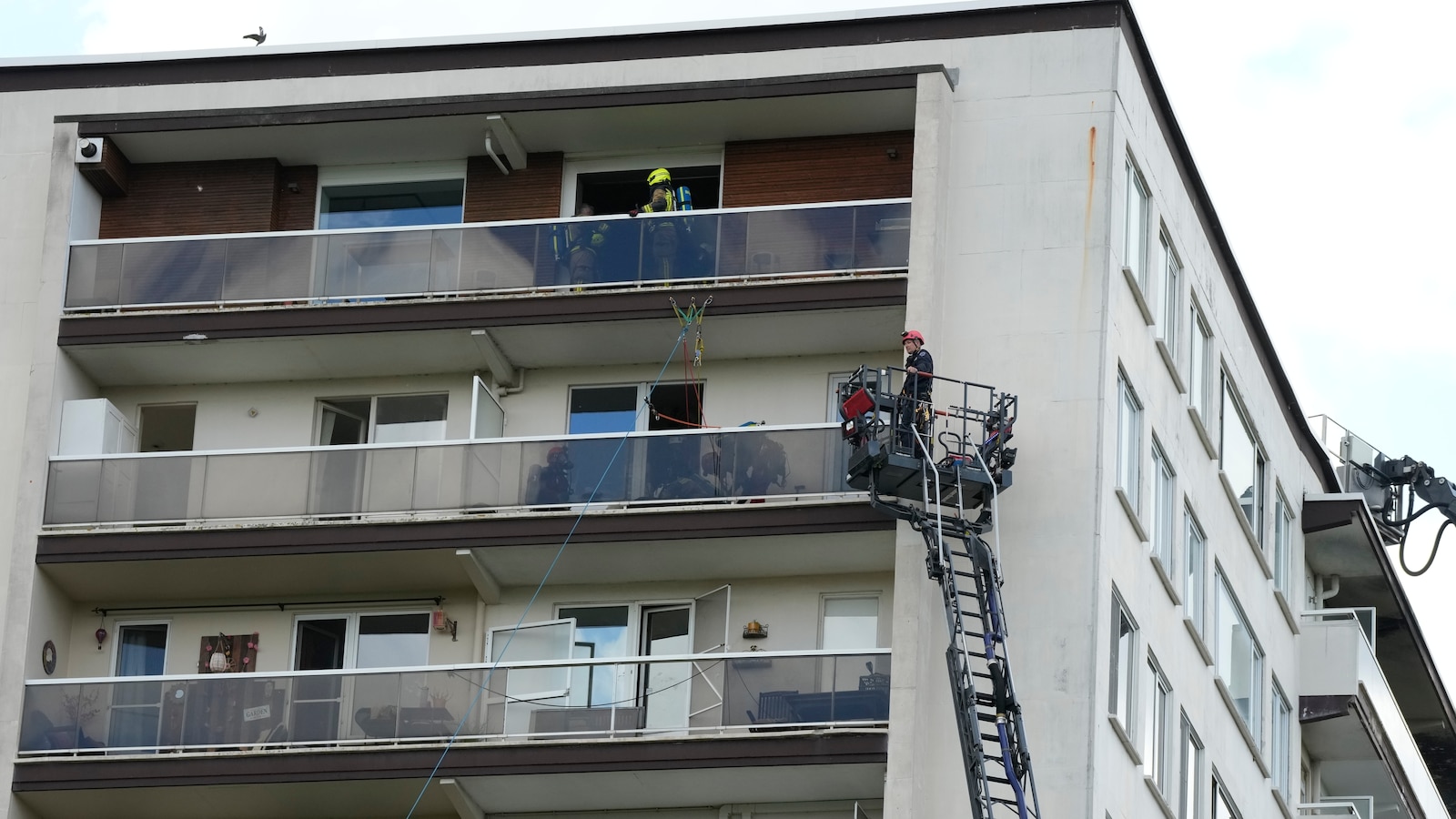 Fire in Belgian apartment block leaves at least 6 people dead, many injured
