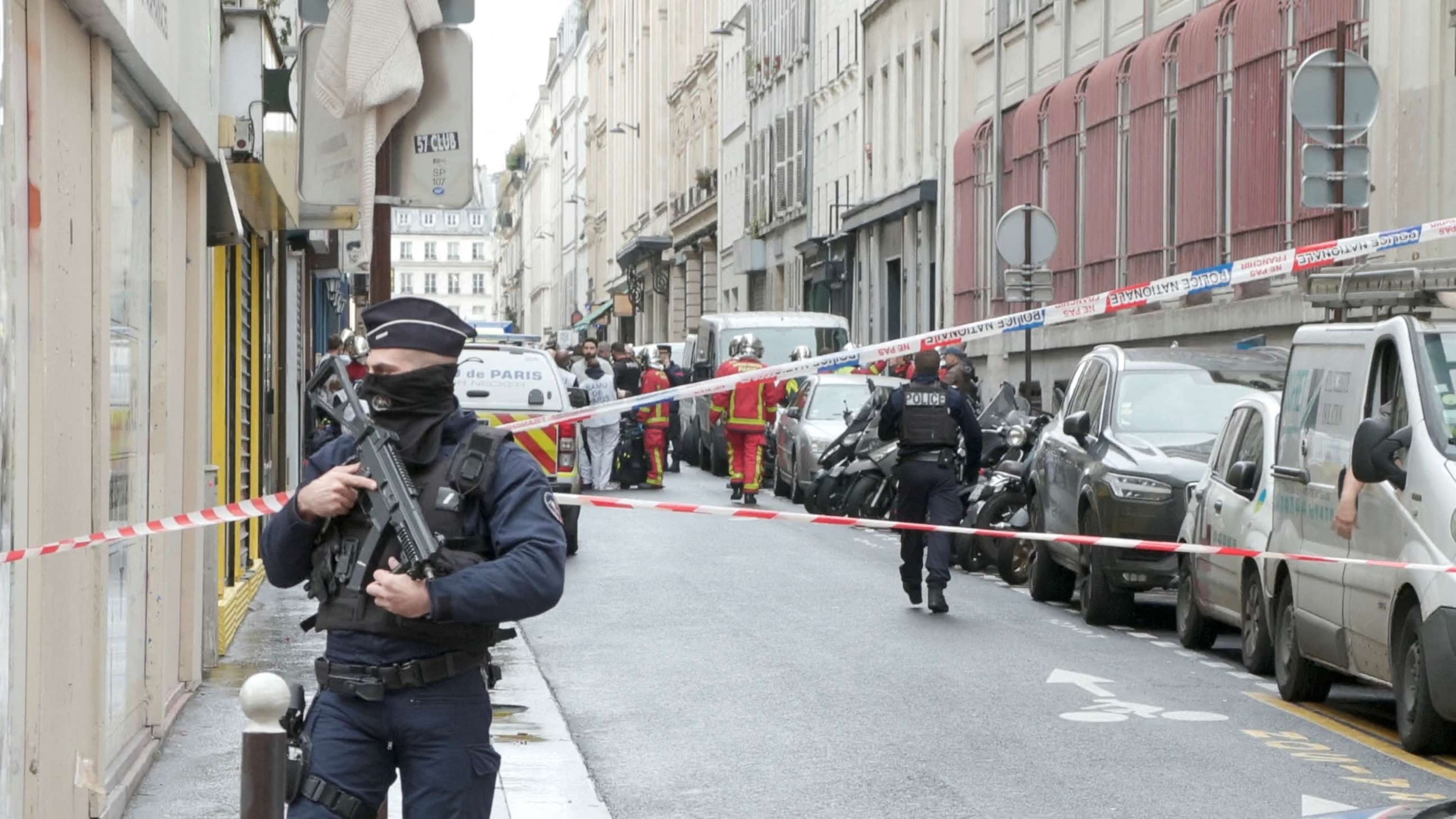 PHOTO: Members of emergency services work at the site where gunshots were fired in central Paris, Dec. 23, 2022, in this still image obtained form a social media video.