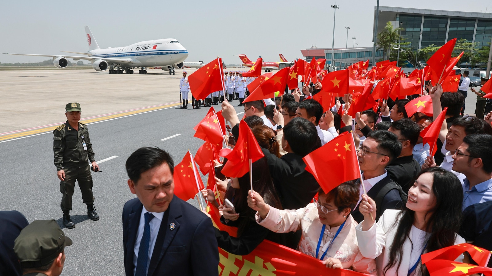 China's Xi says there are no winners in a tariff war as he visits Southeast Asia
