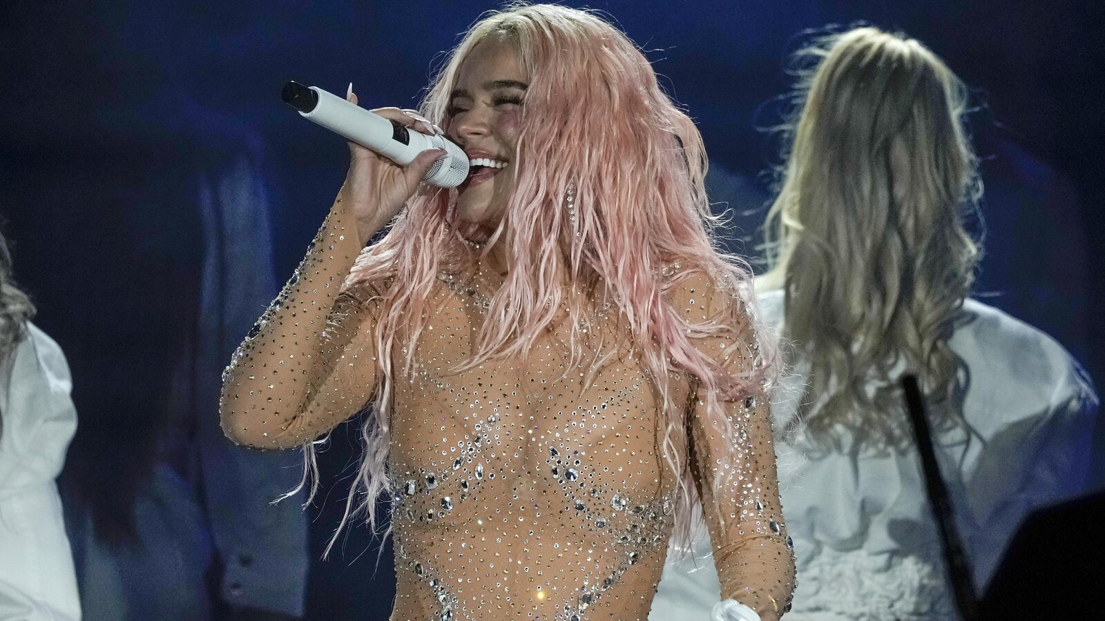 Karol G to headline halftime show during YouTube’s first exclusive NFL broadcast  abcnews.go.com