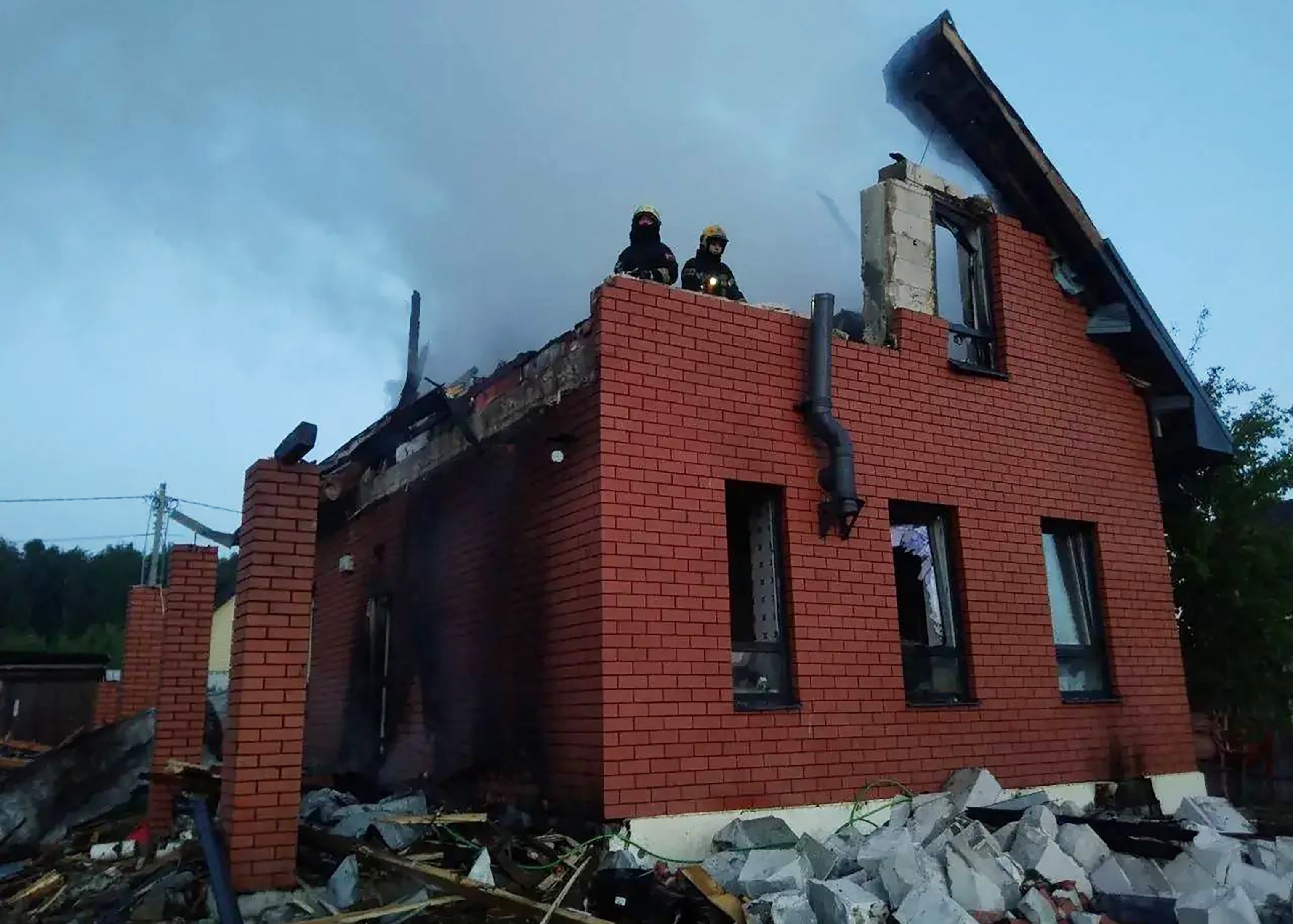 PHOTO: In this handout photograph posted on the official Telegram channel of Moscow Region Governor Andrey Vorobyov on May 17, 2026, Russian rescuers work in a heavily damaged house following an air attack at an undisclosed location in the Moscow region.