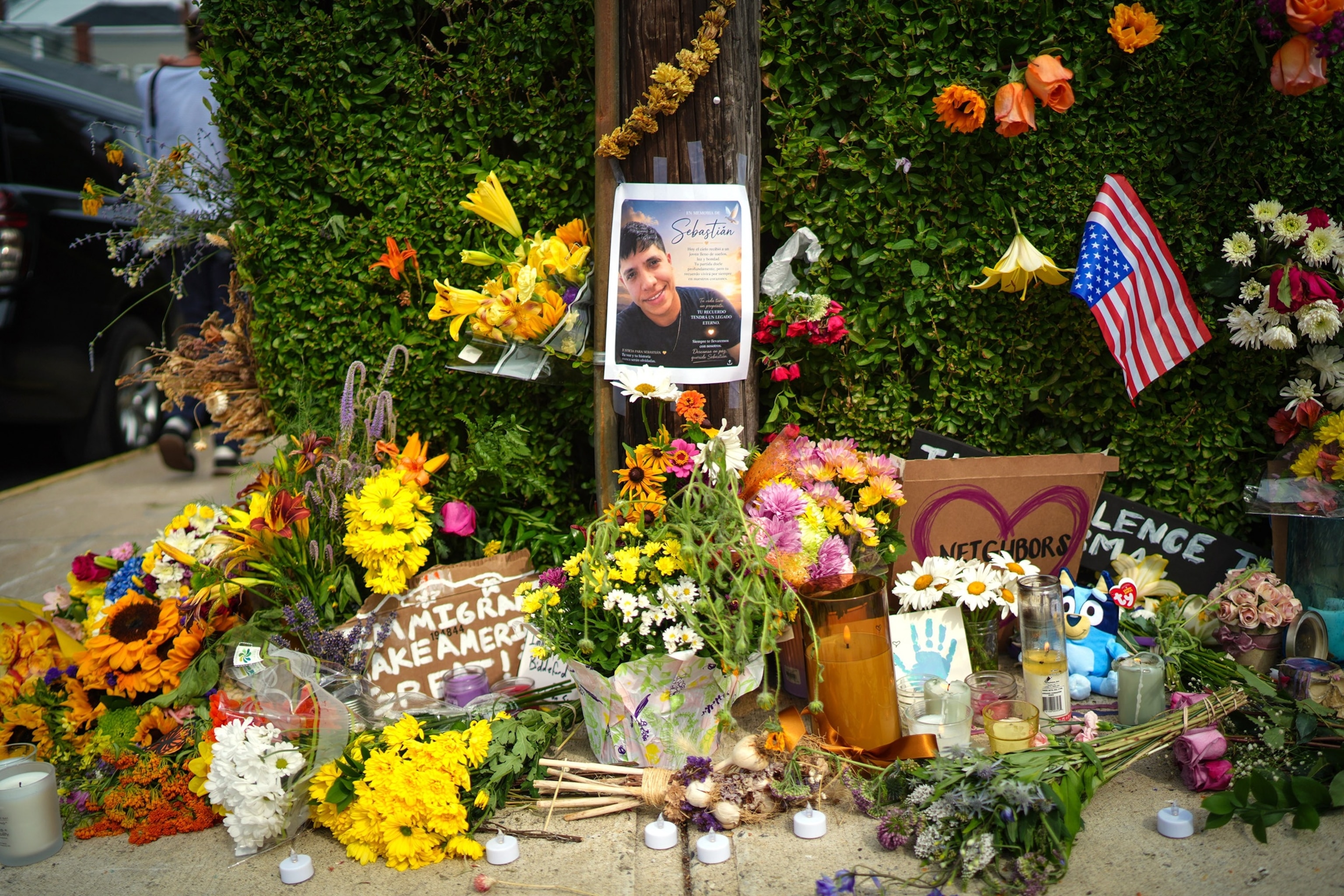 PHOTO: A makeshift memorial is seen a day after a man was fatally shot by U.S. Immigration and Customs Enforcement (ICE) agents, on July 14, 2026, in Biddeford, Maine. 