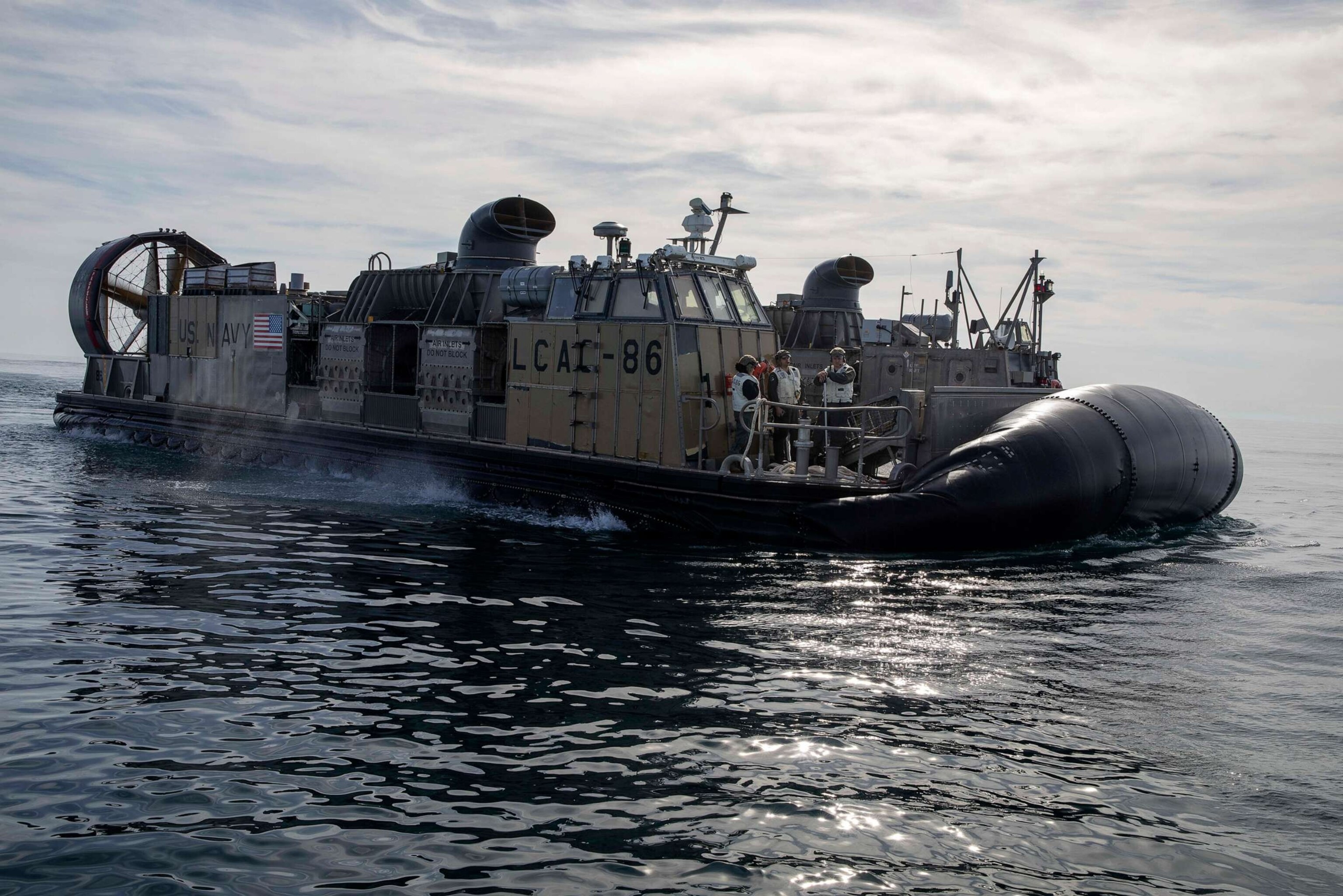 PHOTO: Sailors assigned to Assault Craft Unit (ACU) Four operate landing craft air cushions (LCAC) during recovery efforts of a high-altitude balloon in the Atlantic Ocean, Feb. 8, 2023.