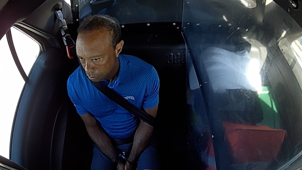 Video Body camera footage released in Tiger Woods rollover car crash: 'I'm being arrested?'