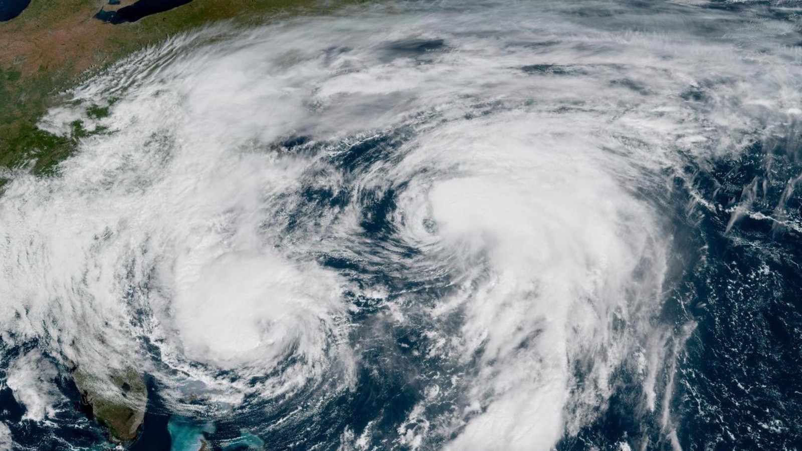 Hurricanes Humberto and Imelda charge toward Bermuda as the tiny island prepares