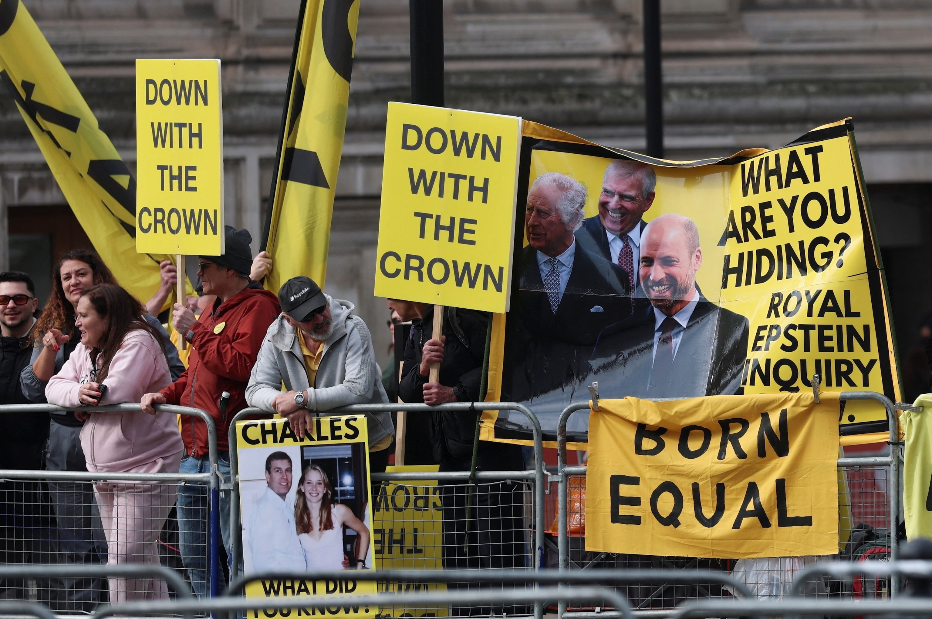 PHOTO: Activists from anti-monarchy group Republic protest outside Westminster Abbey in London