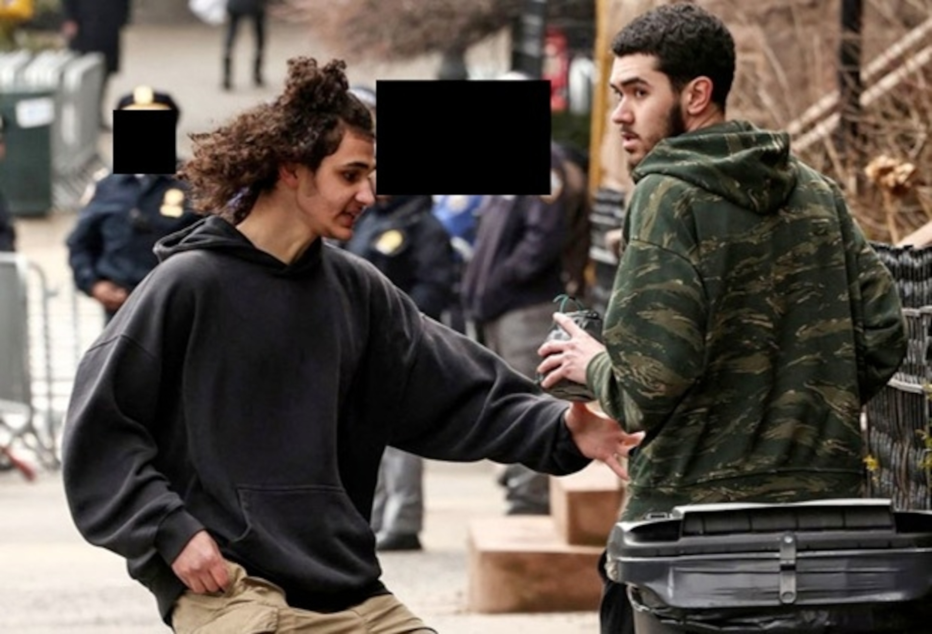 PHOTO: : A federal criminal complaint includes photos of suspects Emir Balat and Ibrahim Kayumi allegedly preparing improvised explosive devices during a demonstration, March 7, 2026, outside Gracie Mansion.