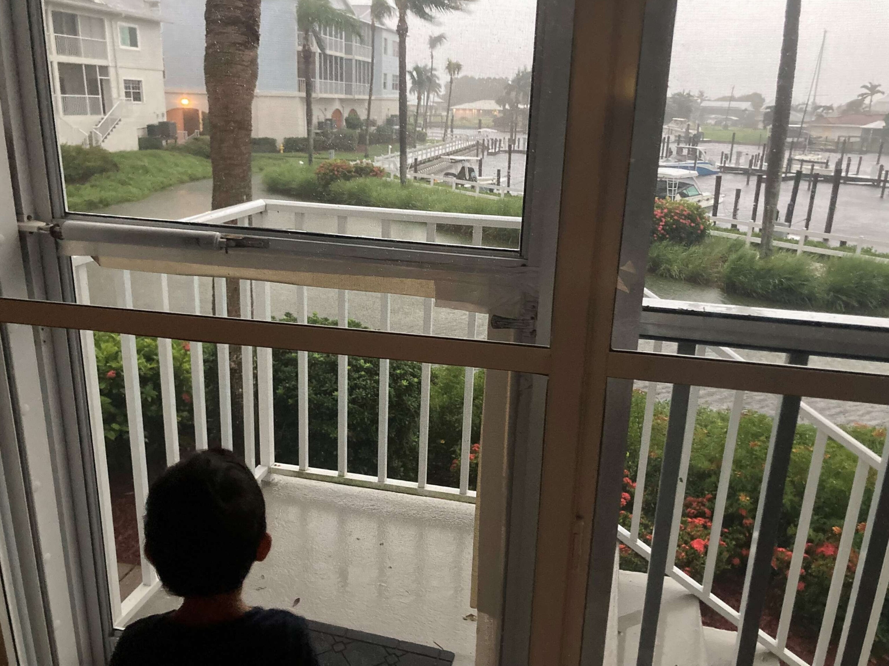 PHOTO: Zhenia Lopez-Figueroa's 2-year-old son watches Hurricane Ian from the family's Fort Myers Beach, Florida, apartment.