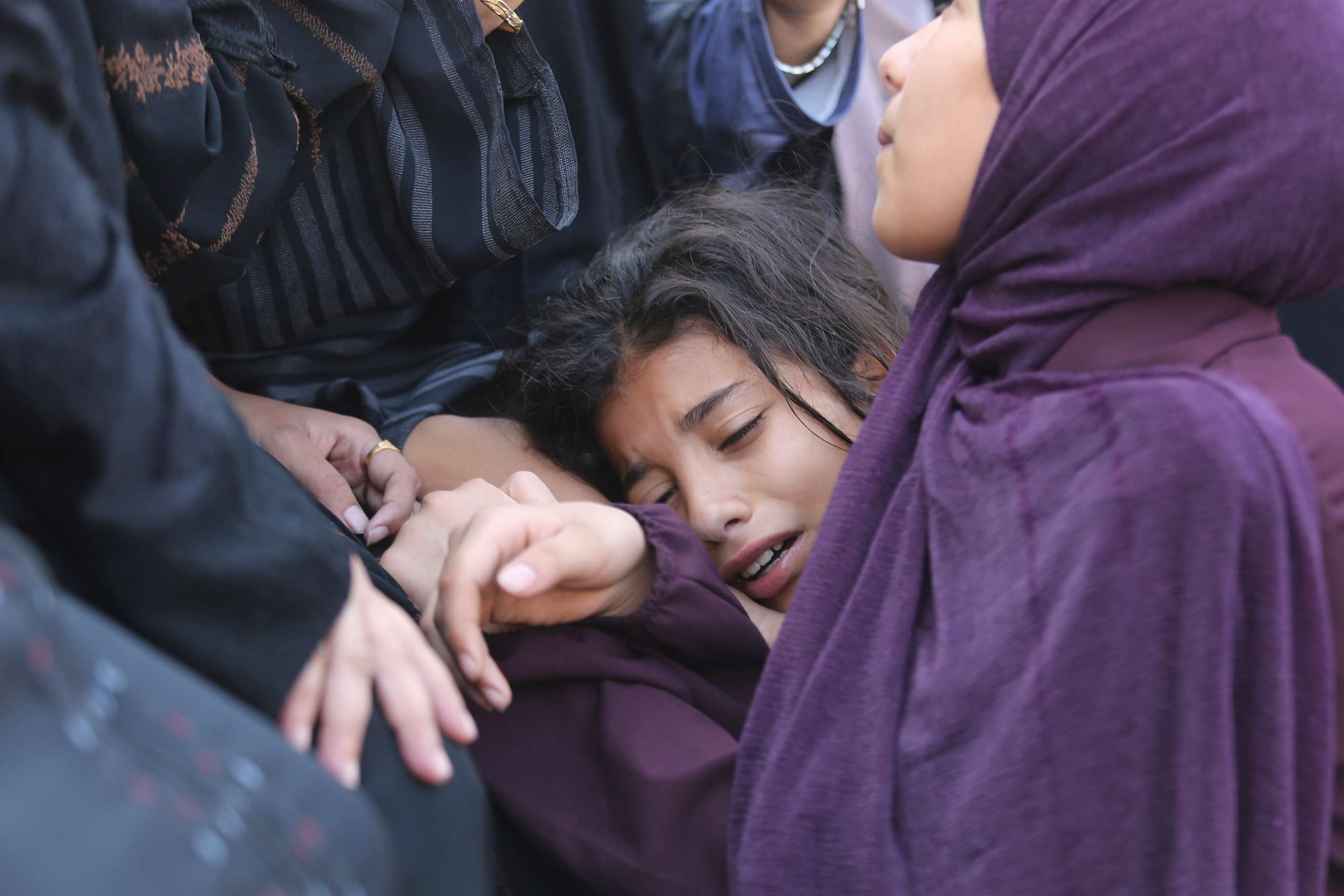 PHOTO: A Palestinian girl cries during the funeral of Amir Ganan, who was killed in an Israeli airstrike on the buildings in Khan Younis, Gaza Strip, Oct. 10, 2023.