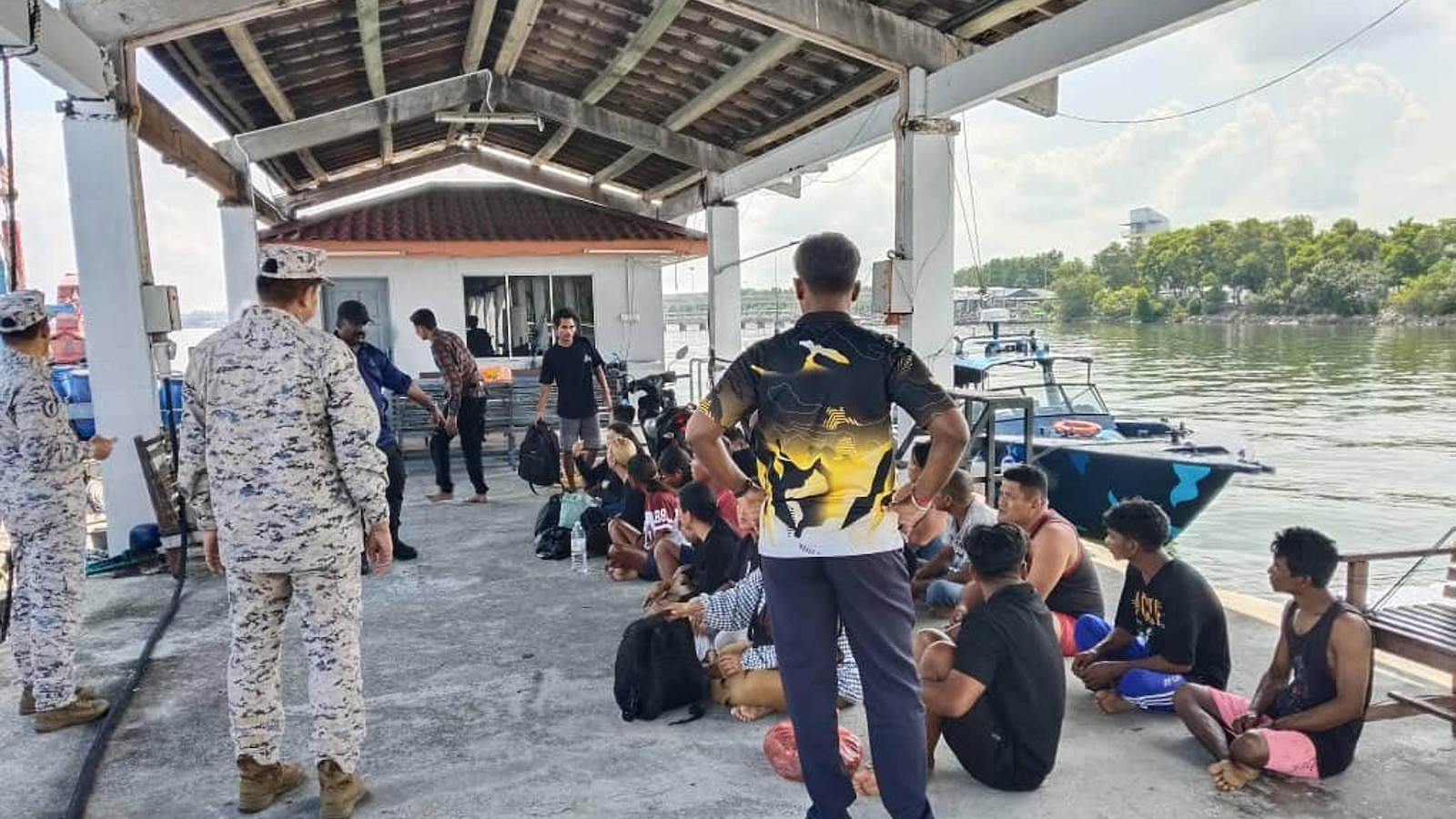 Malaysia searches for 14 missing Indonesians after a migrant boat sinks