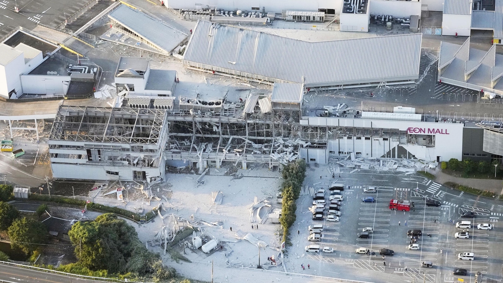At least two people died at a shopping center that partially collapsed after a powerful earthquake rocked southern Japan on Tuesday, according to local authorit