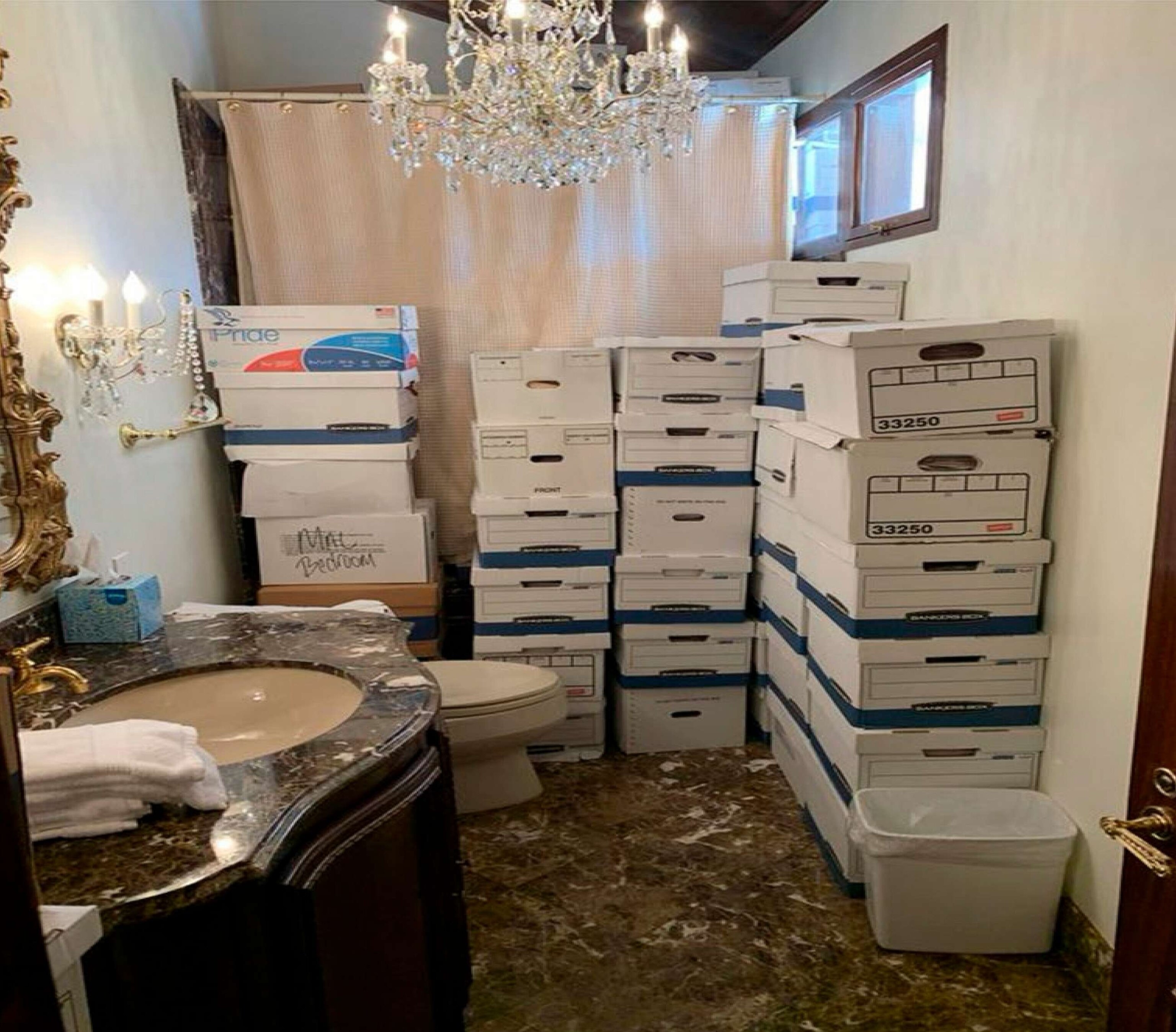 PHOTO: This image, contained in the indictment against former President Donald Trump, shows boxes of records stored in a bathroom and shower in the Lake Room at Trump's Mar-a-Lago estate in Palm Beach, Fla.