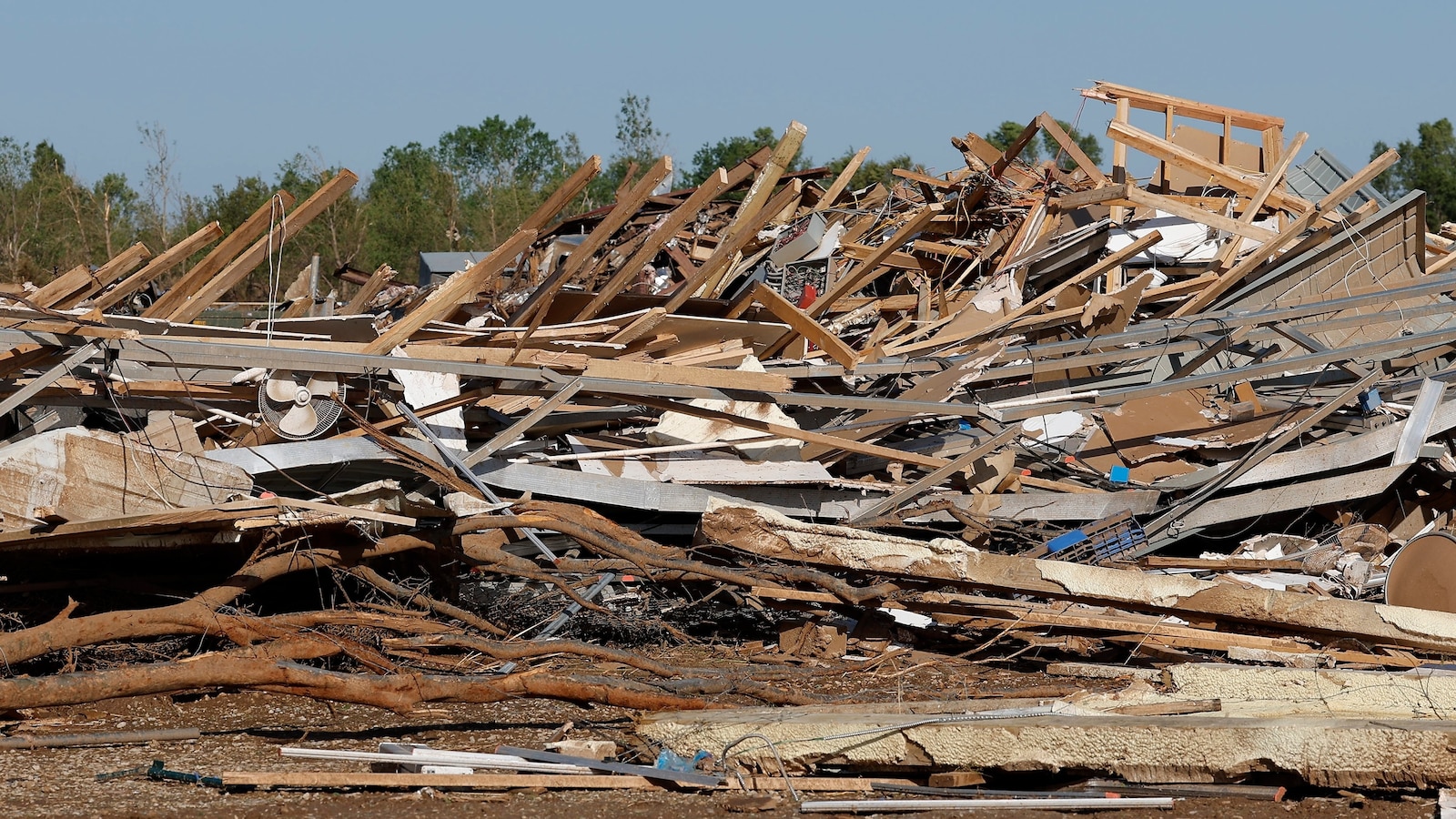 Enid, Oklahoma, surveys damage after massive tornado tears through city