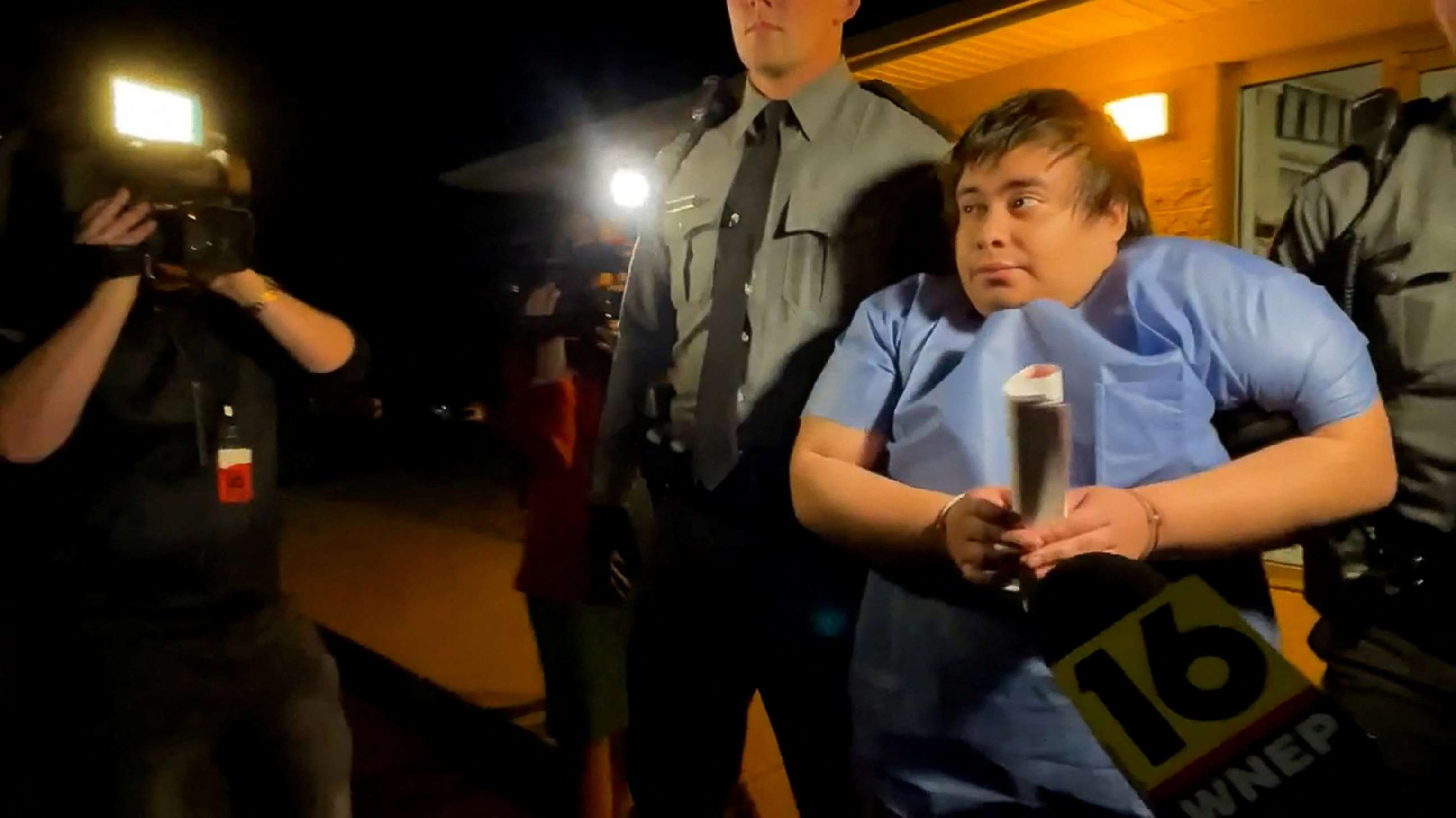 PHOTO: Adrian Oswaldo Sura Reyes, who is a suspect in both a fatal crash and a homicide, is escorted by State Police troopers from their Shickshinny station after his arrest in Berwick, Pa., Aug. 14, 2022.  