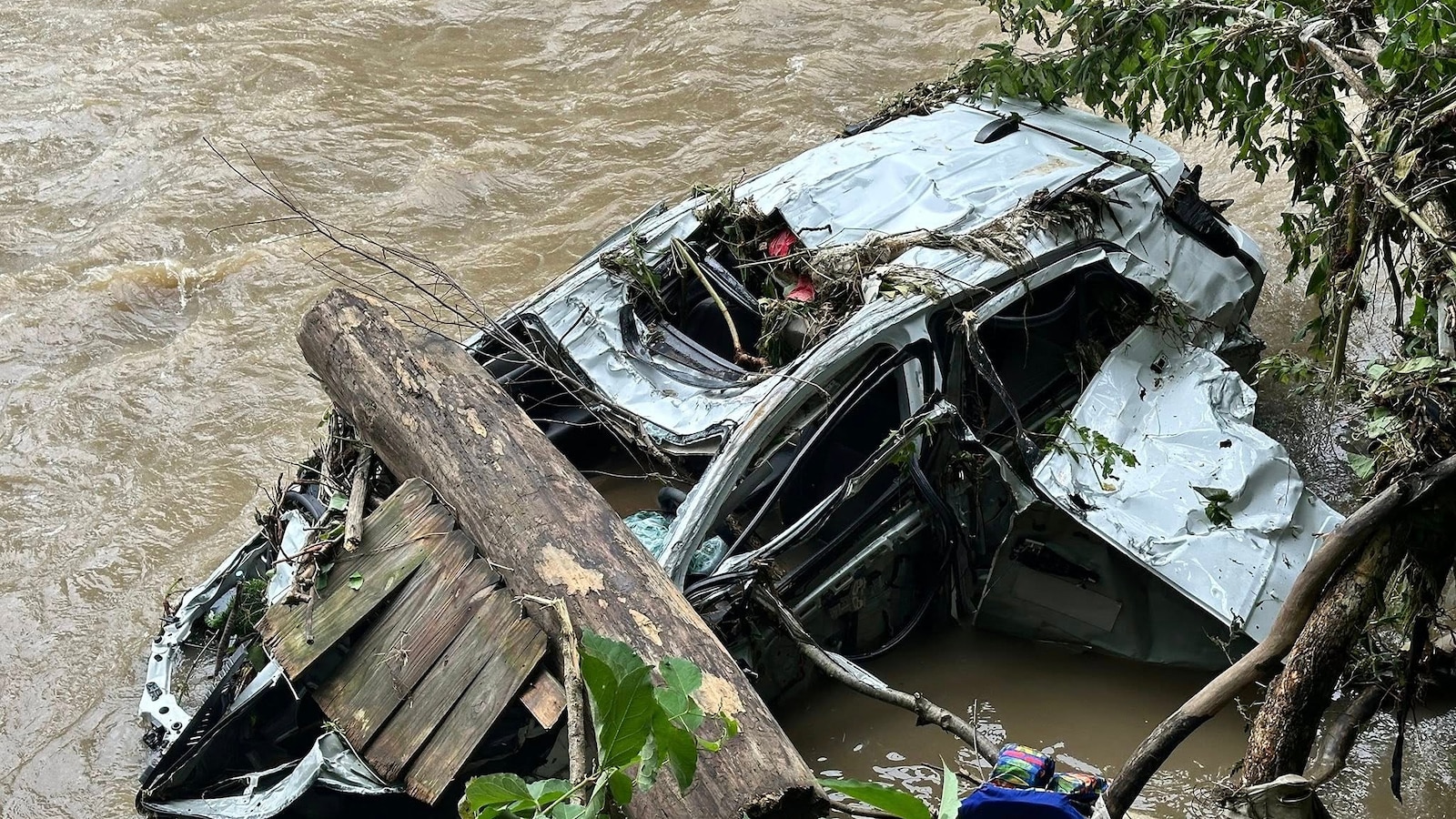 Death toll rises from devastating flash flooding in West Virginia as ...