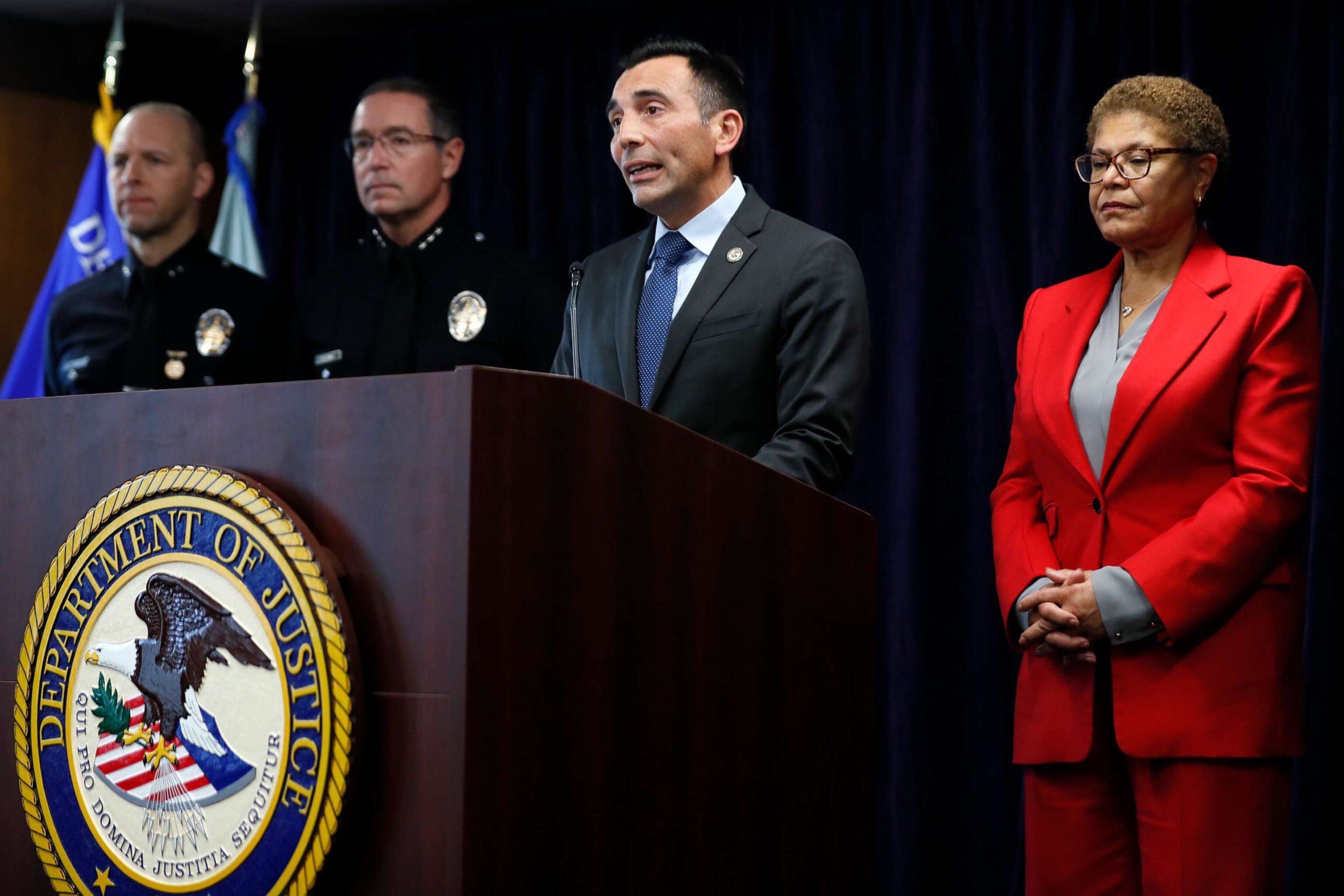 PHOTO: Los Angeles Mayor Karen Bass looks on as U.S. Attorney Martin Estrada speaks at a press conference announcing the arrest of Jaime Tran for the attempted murder of two people outside separate synagogues, Feb. 17, 2023, in Los Angeles.