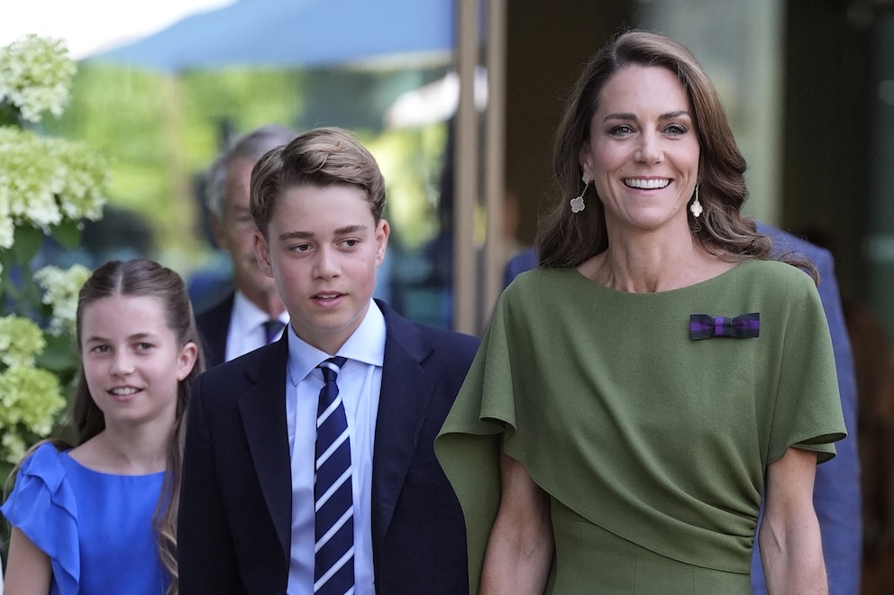 Britain's Catherine, Princess of Wales (R), Britain's Prince George of Wales (C) and Britain's Princess Charlotte of Wales arrive on the last day of the 2026 Wimbledon Championships in Wimbledon, southwest London, on July 12, 2026.