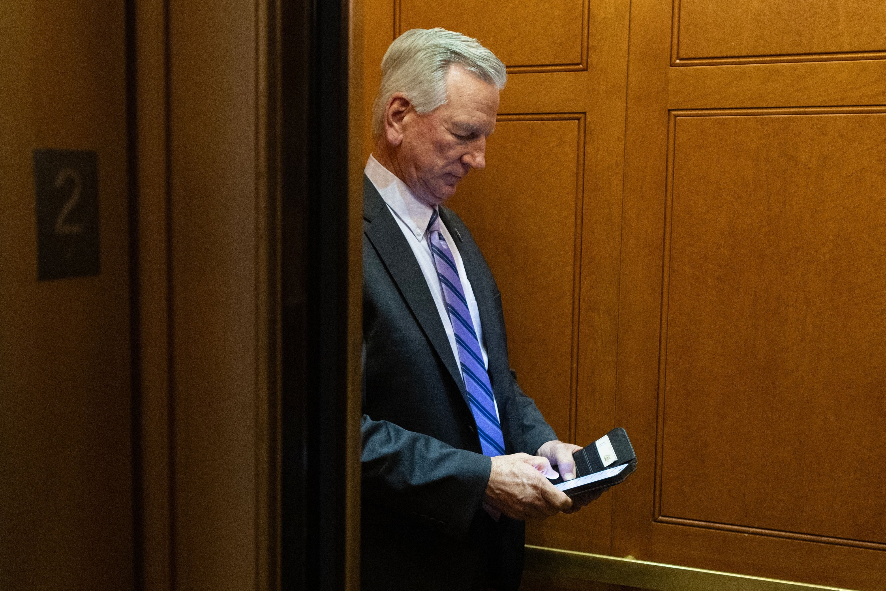 PHOTO: Sen. Tommy Tuberville enters an elevator near the Senate chamber on Capitol Hill in Washington, DC, Nov. 15, 2023.