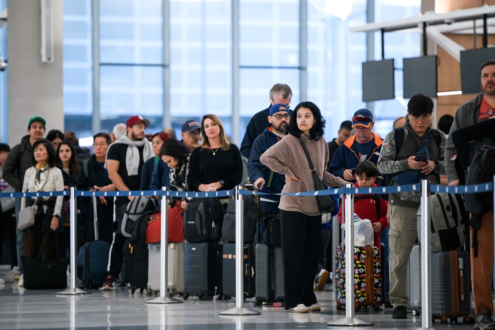 PHOTO: People wait in a security checkpoint line at George Bush Intercontinental Airport in Houston, Texas, on Nov. 4, 2025. 