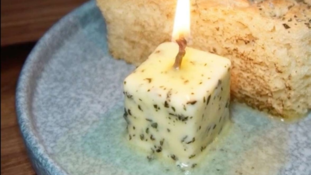 Butter candles add edible ambiance to the table and TikTok 'loaves' it