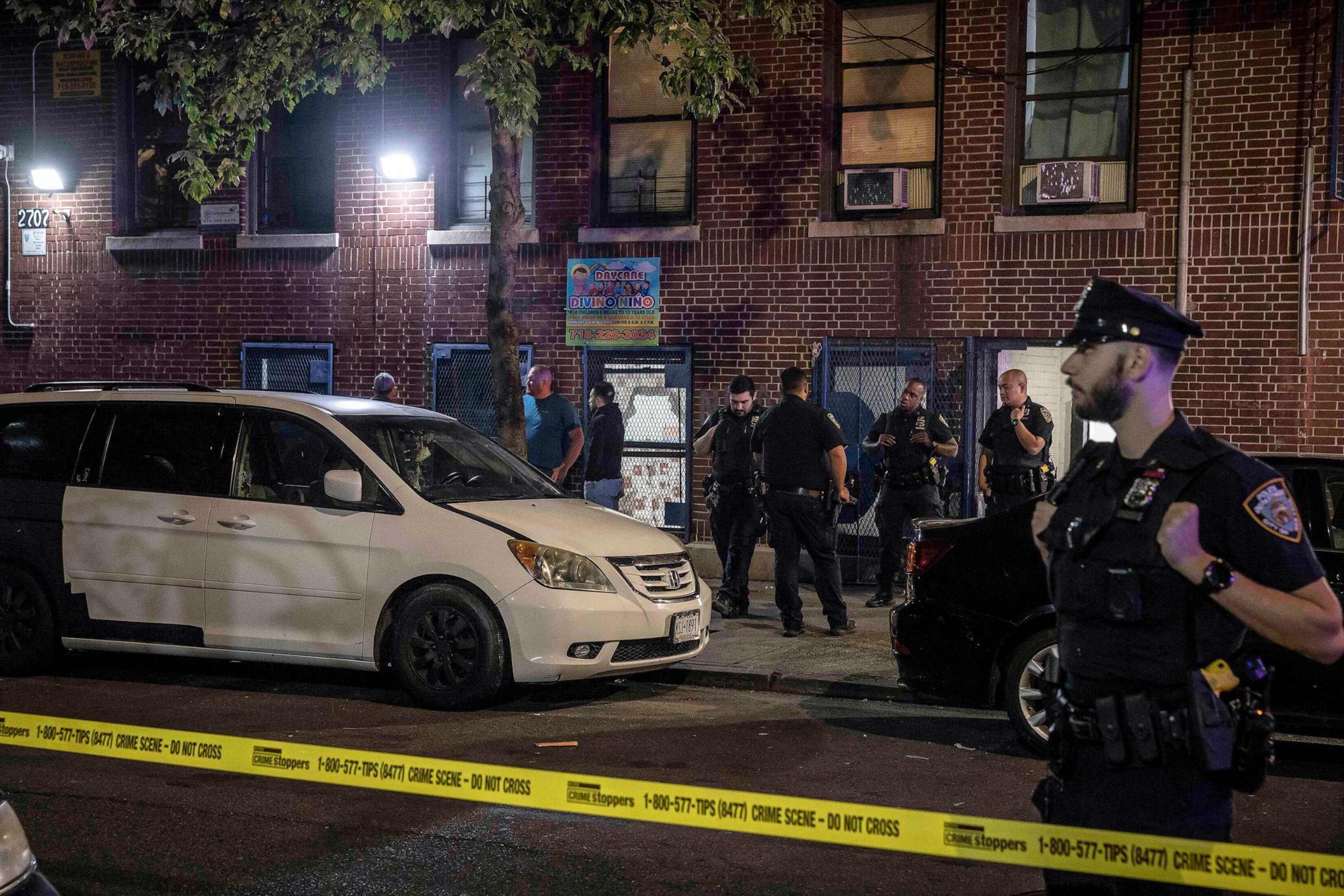 PHOTO: Police investigators at a day care in the Bronx, after a 1-year-old boy died and three other young children were hospitalized, Sept. 15, 2023.