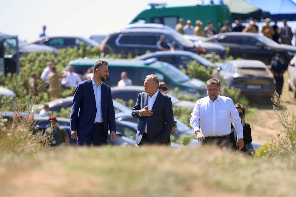 PHOTO: Polish Prime Minister Donald Tusk, Interior Minister Marcin Kierwinski and Defence Minister Wladyslaw Kosiniak-Kamysz visit the site where an unidentified flying object fell near the village of Tarnawa-Kolonia, near Lublin, Poland, July 30, 2026.