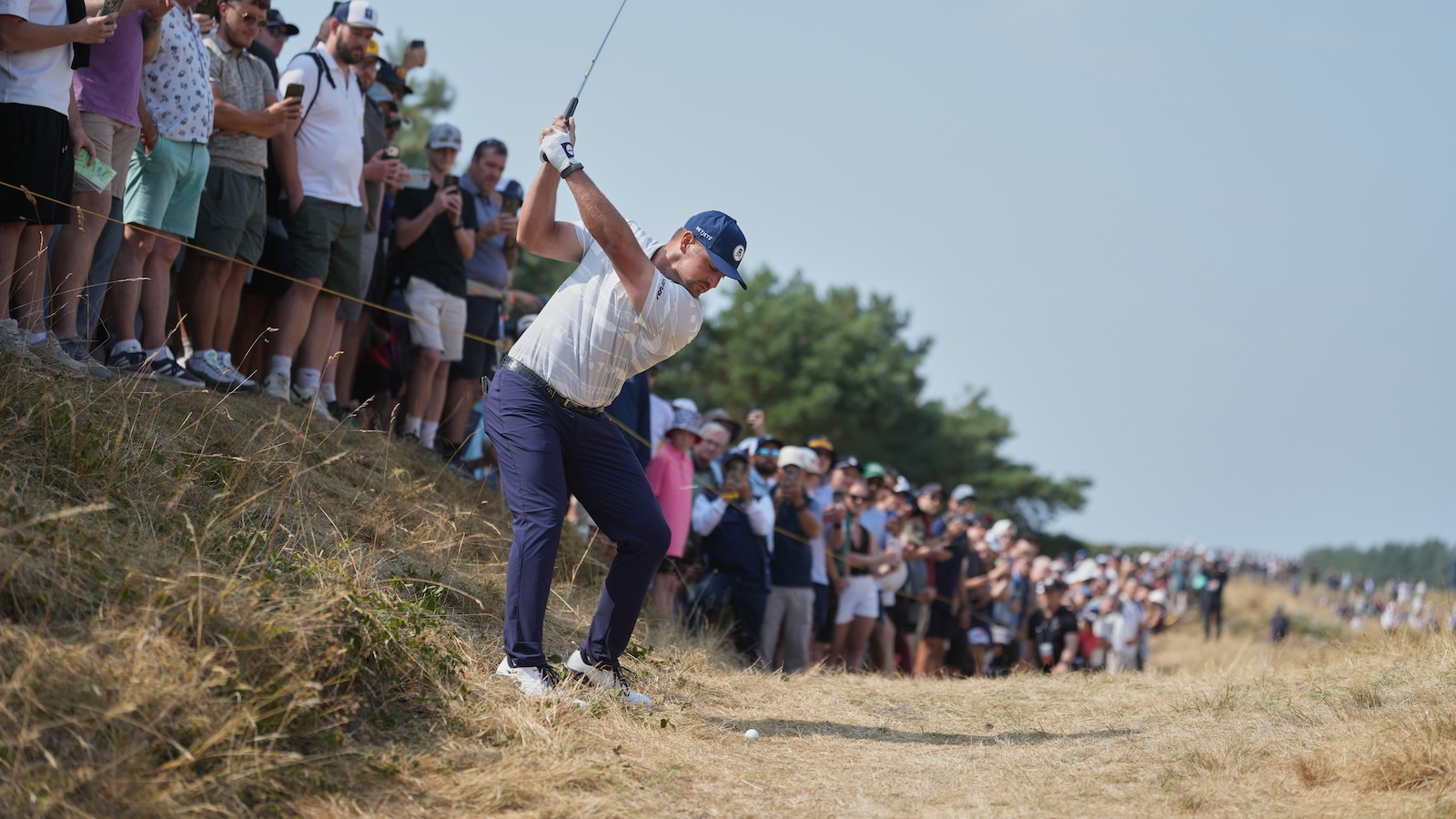 Bryson DeChambeau interacting with fans at Royal Birkdale.
