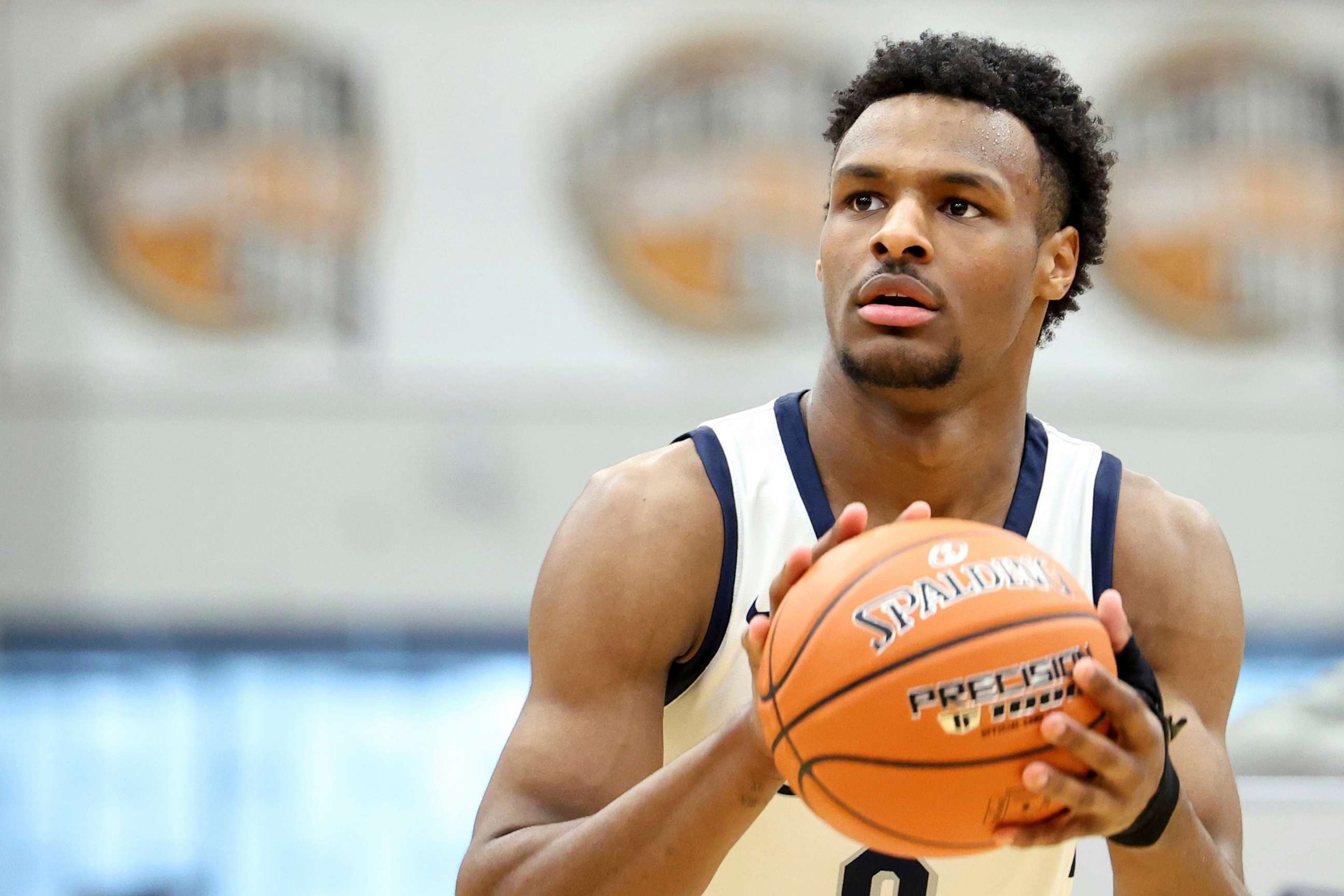 PHOTO: Sierra Canyon's Bronny James warms up at halftime during a high school basketball game against Christopher Columbus at the Hoophall Classic, Jan. 16, 2023, in Springfield, Mass.