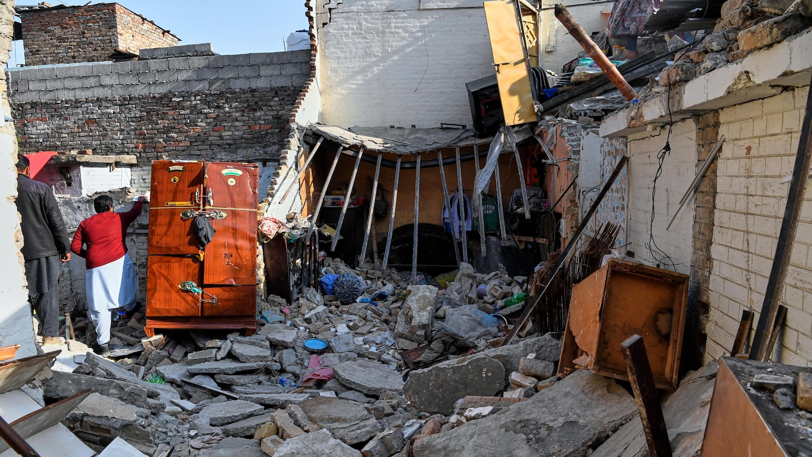 Bride and groom among 8 killed in gas cylinder blast at wedding in Pakistan