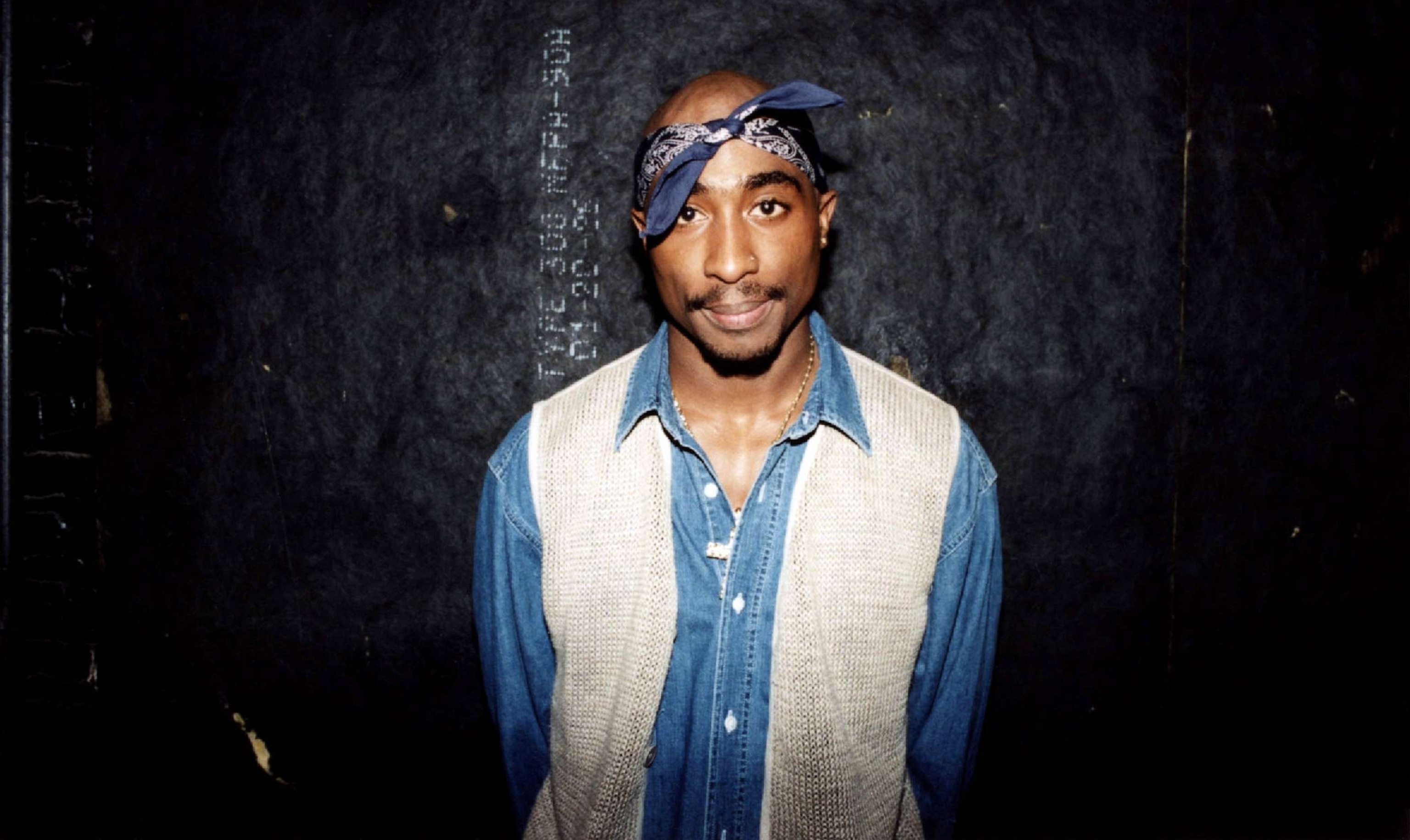 PHOTO: FILE - Rapper Tupac Shakur poses for photos backstage after his performance at the Regal Theater in Chicago, in March 1994.