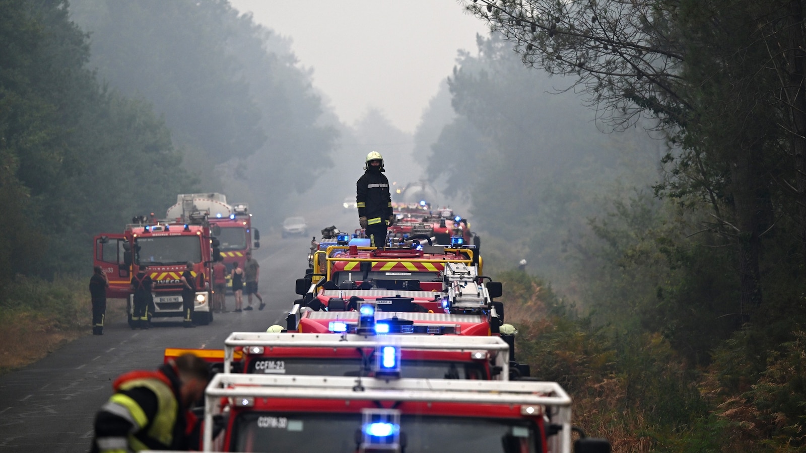 Coverage image for: At least 1 dead, more than 300,000 evacuated amid wildfires in Spain, France