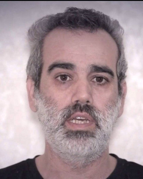 Stills from a video released on April 27, 2024, on a Hamas-run Telegram channel that showed men identified as Keith Siegel and Omri Miran.