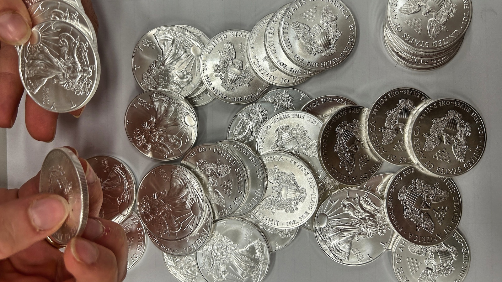 A tip about a swerving van leads police to 66,000 US silver coins in a fraud case