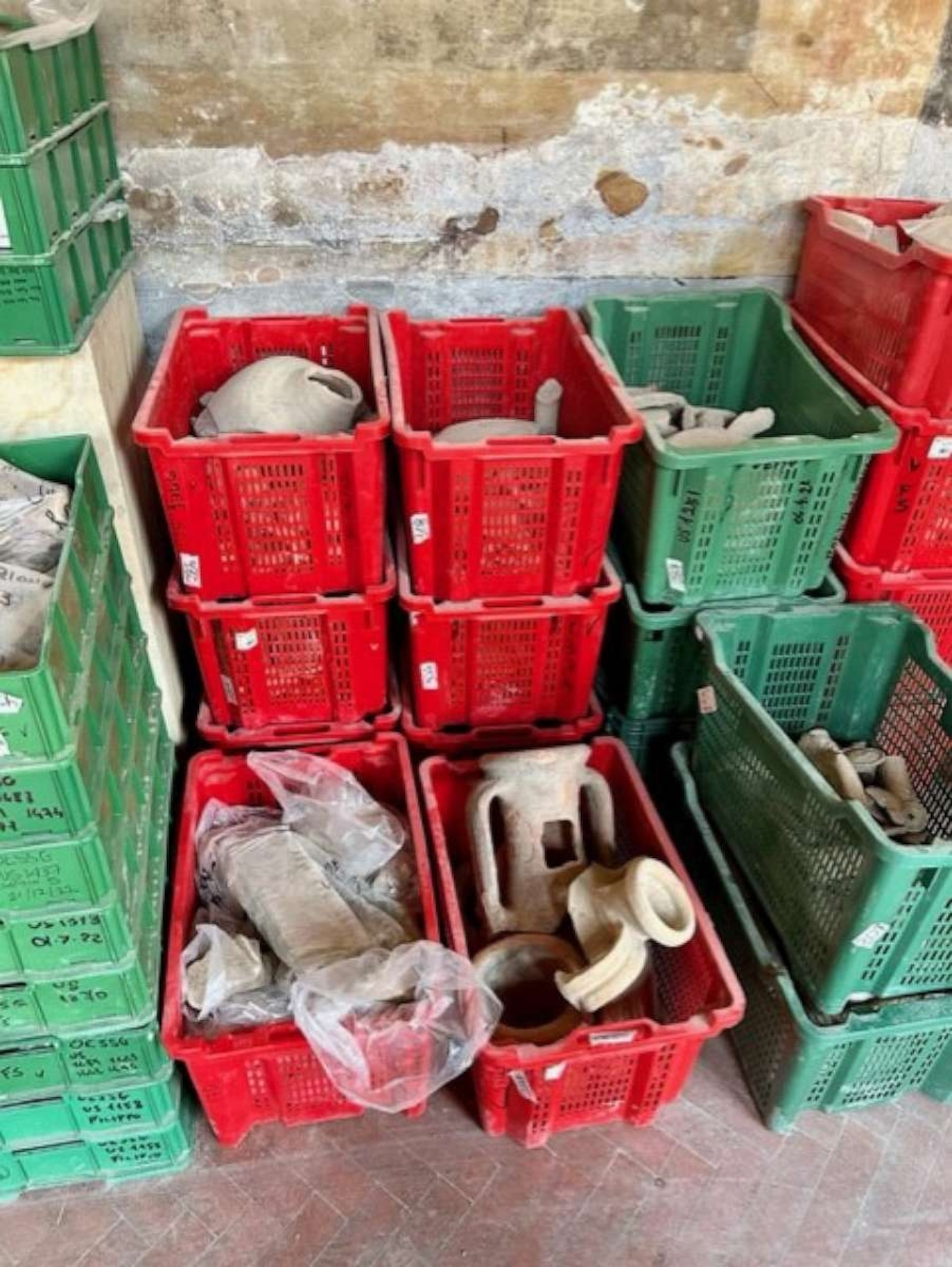 PHOTO: Artifacts found at the excavation site are stored in containers.