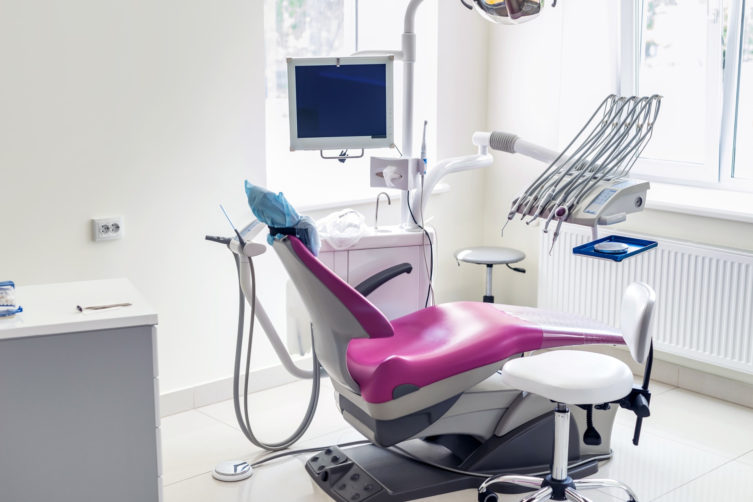 PHOTO: Modern patient chair and equipment in dentistry office.