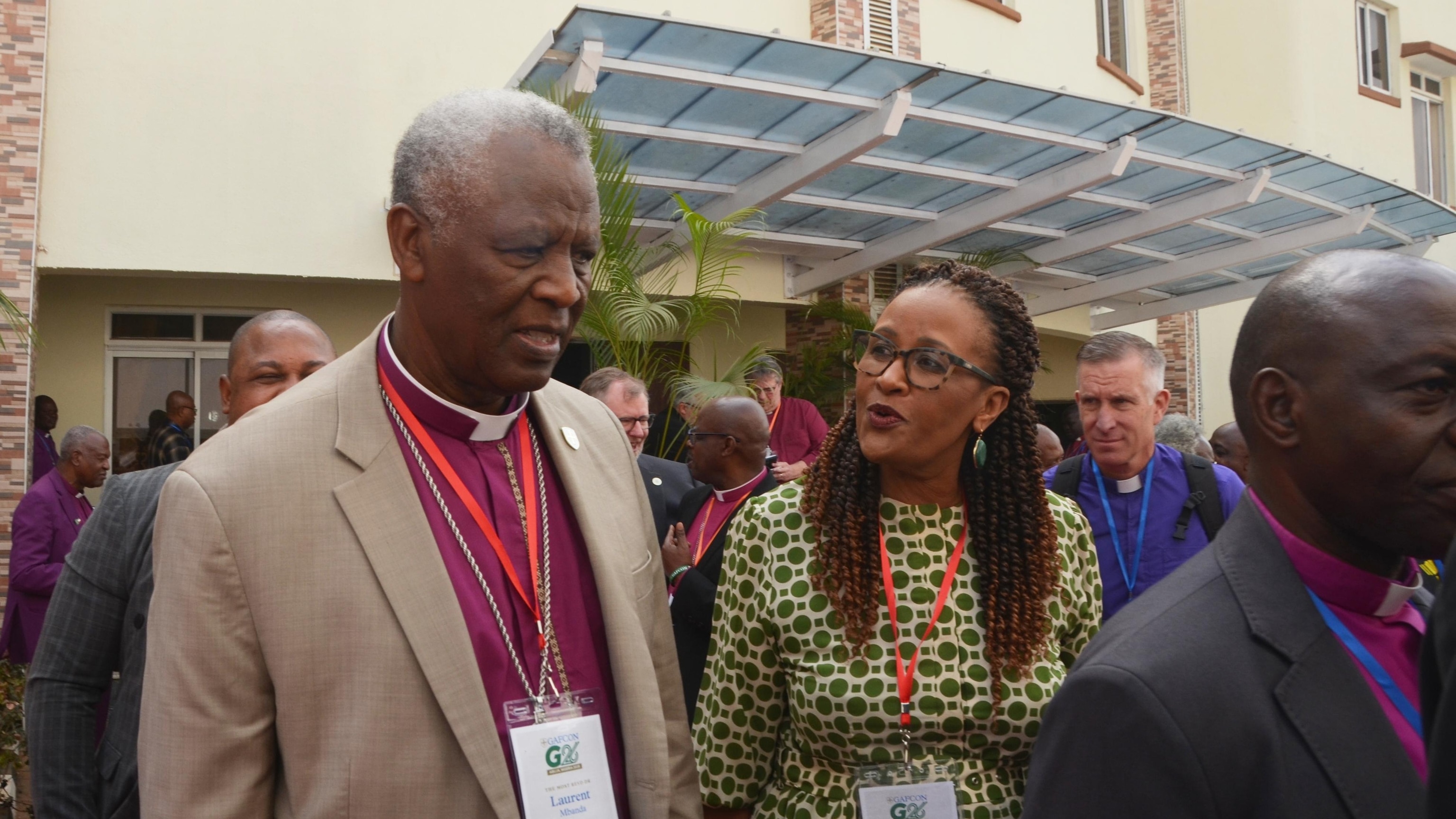 Rwanda Archbishop Laurent Mbanda and his wife Chantel leaving a religious service at the GAFCON G26 conference in Abuja Nigeria March 2026