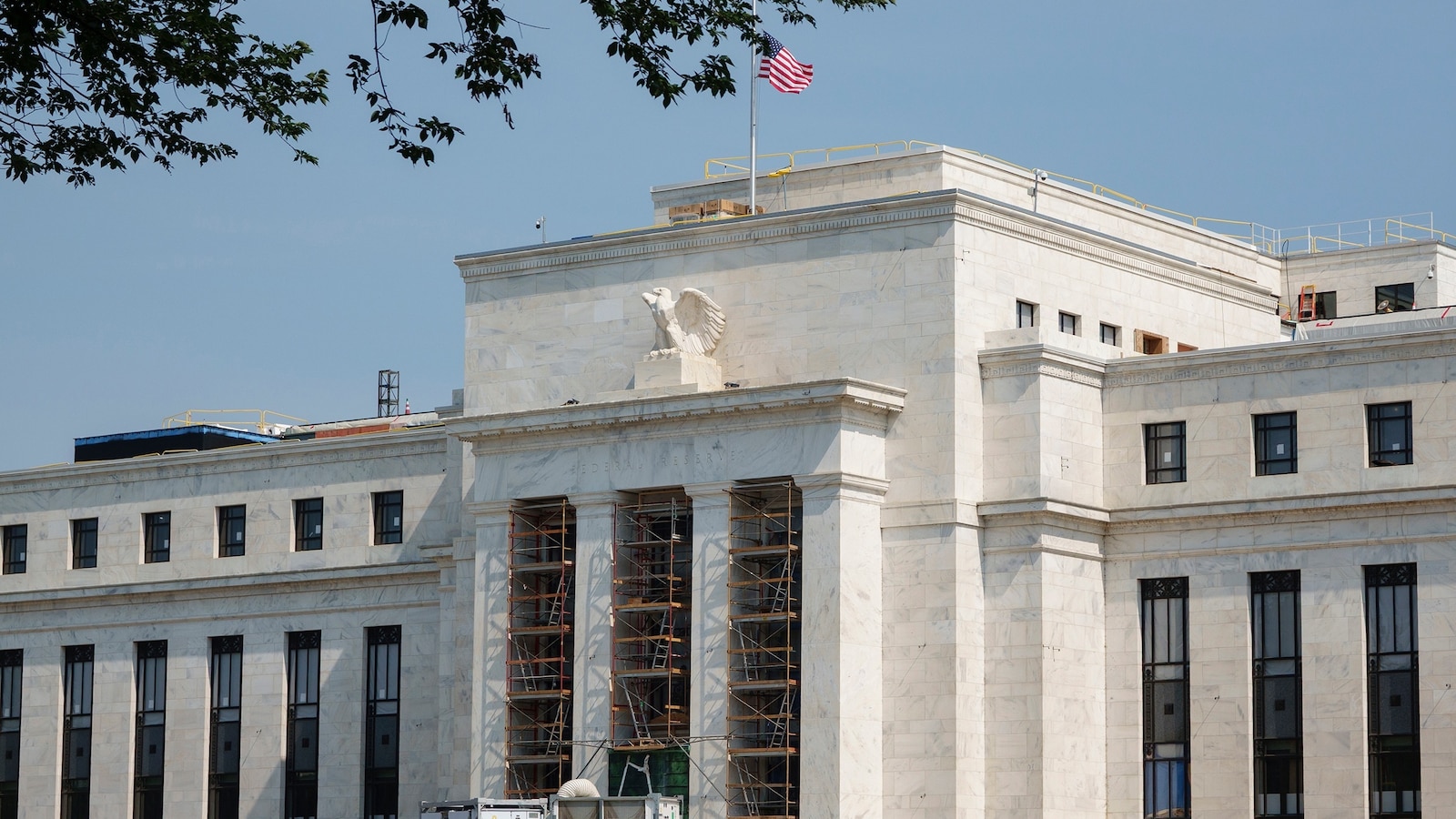 Fed holds interest rates steady as economy weathers resurgent inflation