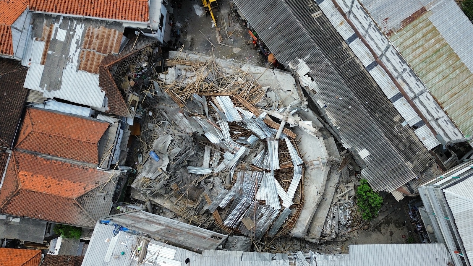 Dozens of students trapped after school collapses in Indonesia, officials say